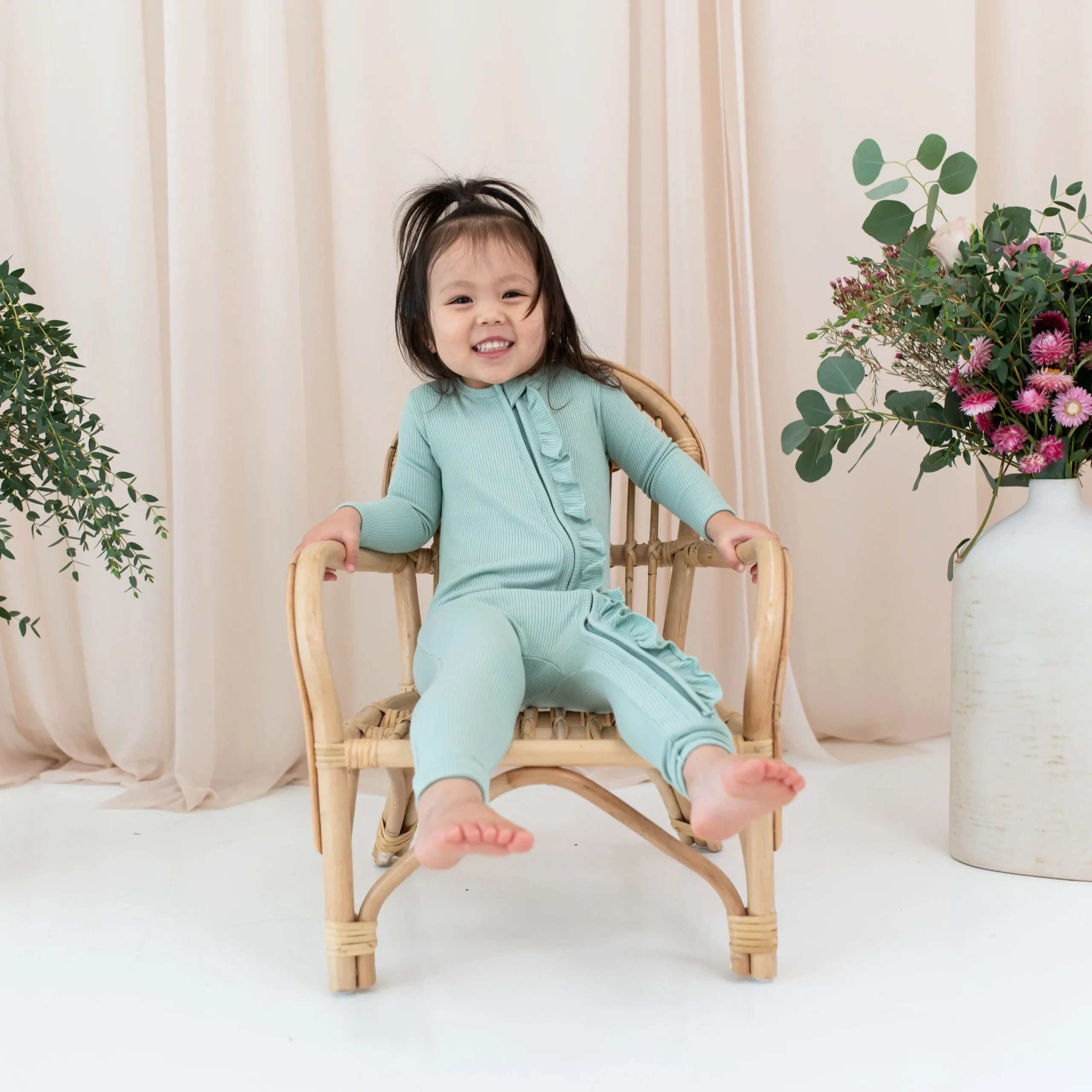 Kyte Baby Ribbed Ruffle Zipper Romper in Sage Outlet