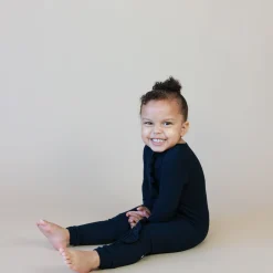 Kyte Baby Ribbed Ruffle Zipper Romper in Midnight