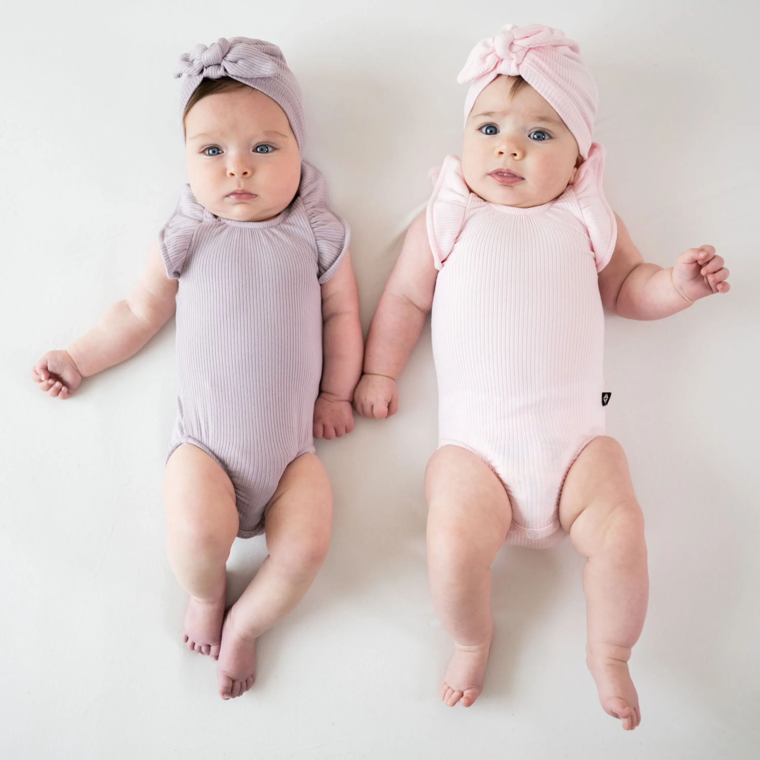Kyte Baby Ribbed Sleeveless Ruffle Leotard in Sakura New