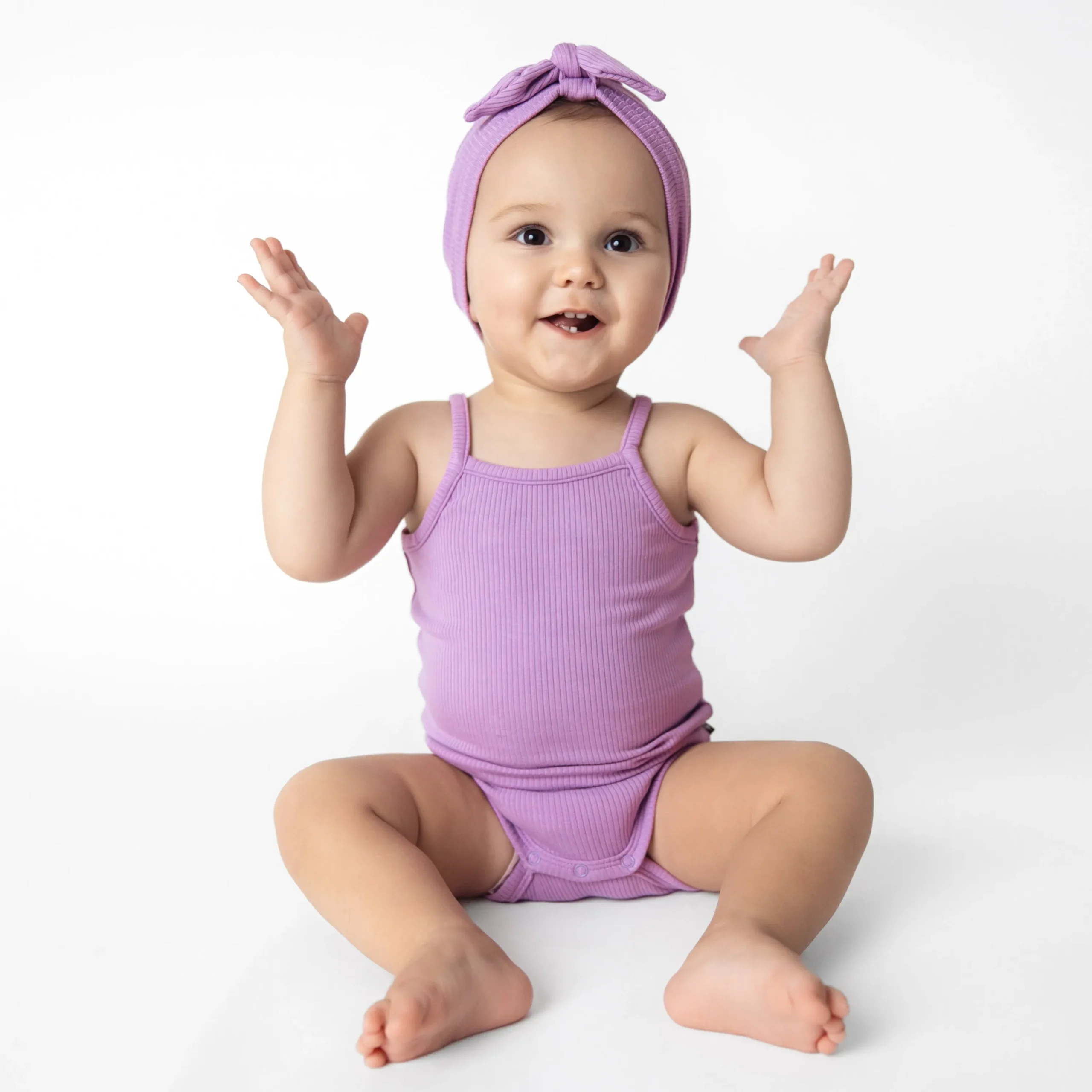 Kyte Baby Ribbed Spaghetti Strap Bodysuit in Poi New