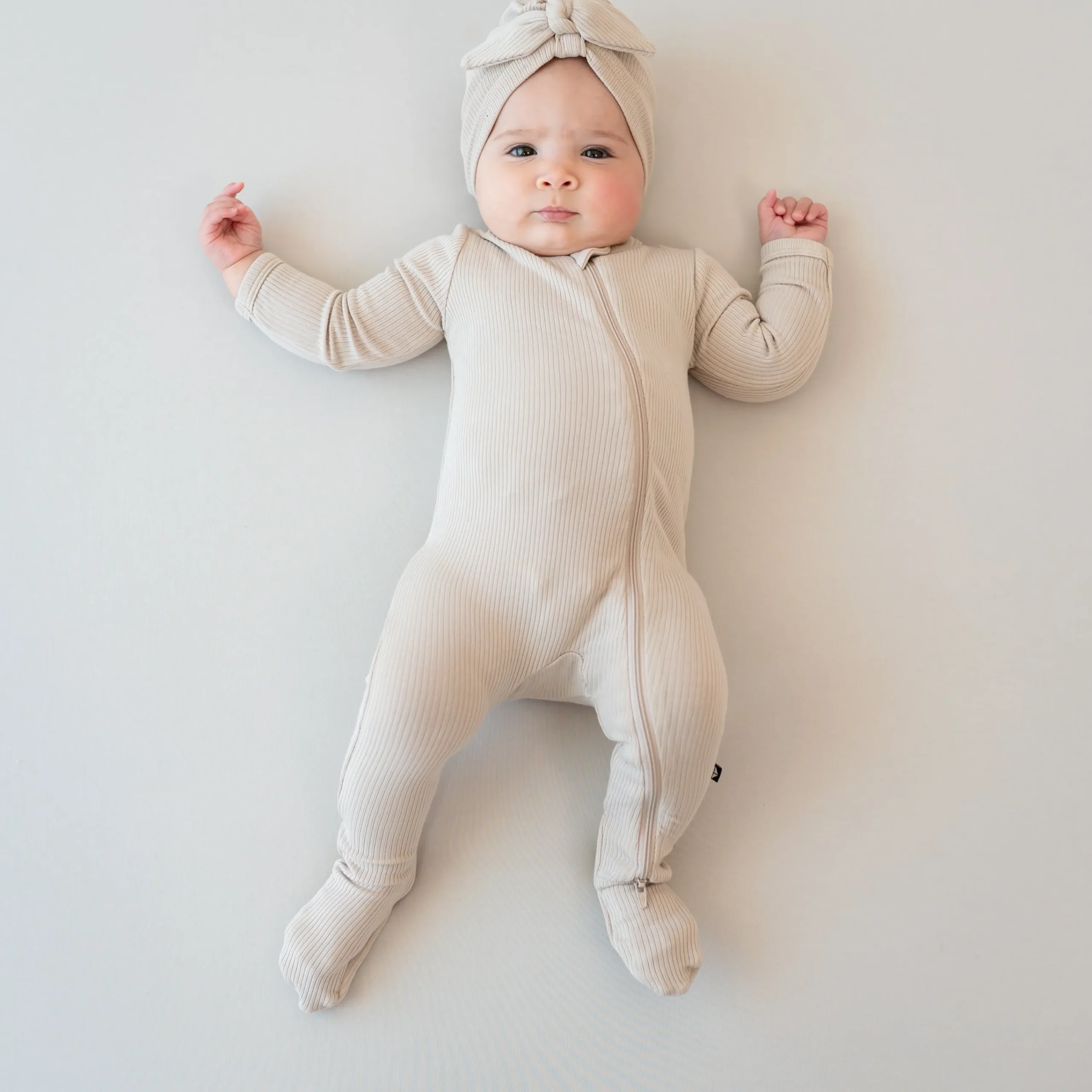 Kyte Baby Ribbed Zipper Footie in Bisque