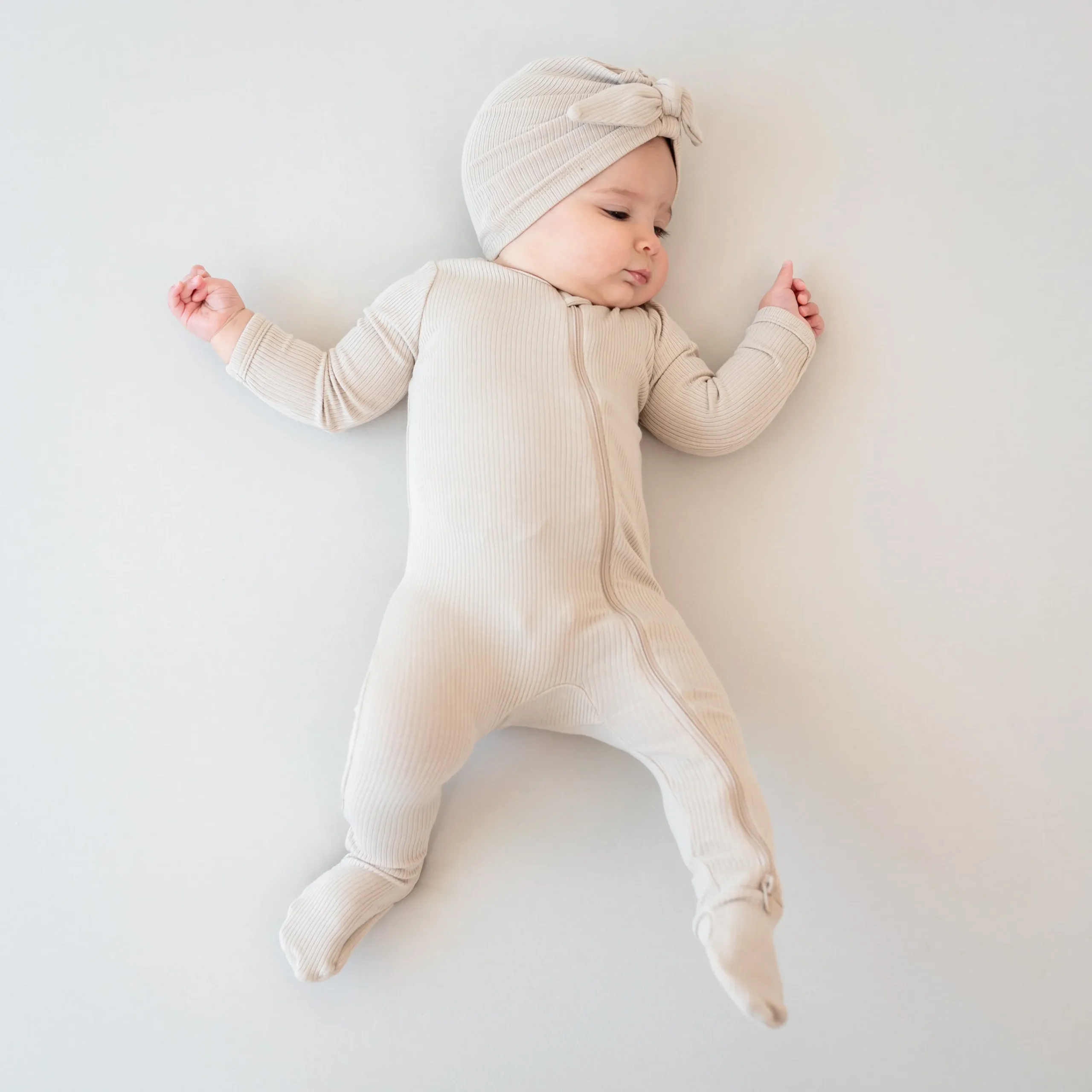 Kyte Baby Ribbed Zipper Footie in Bisque