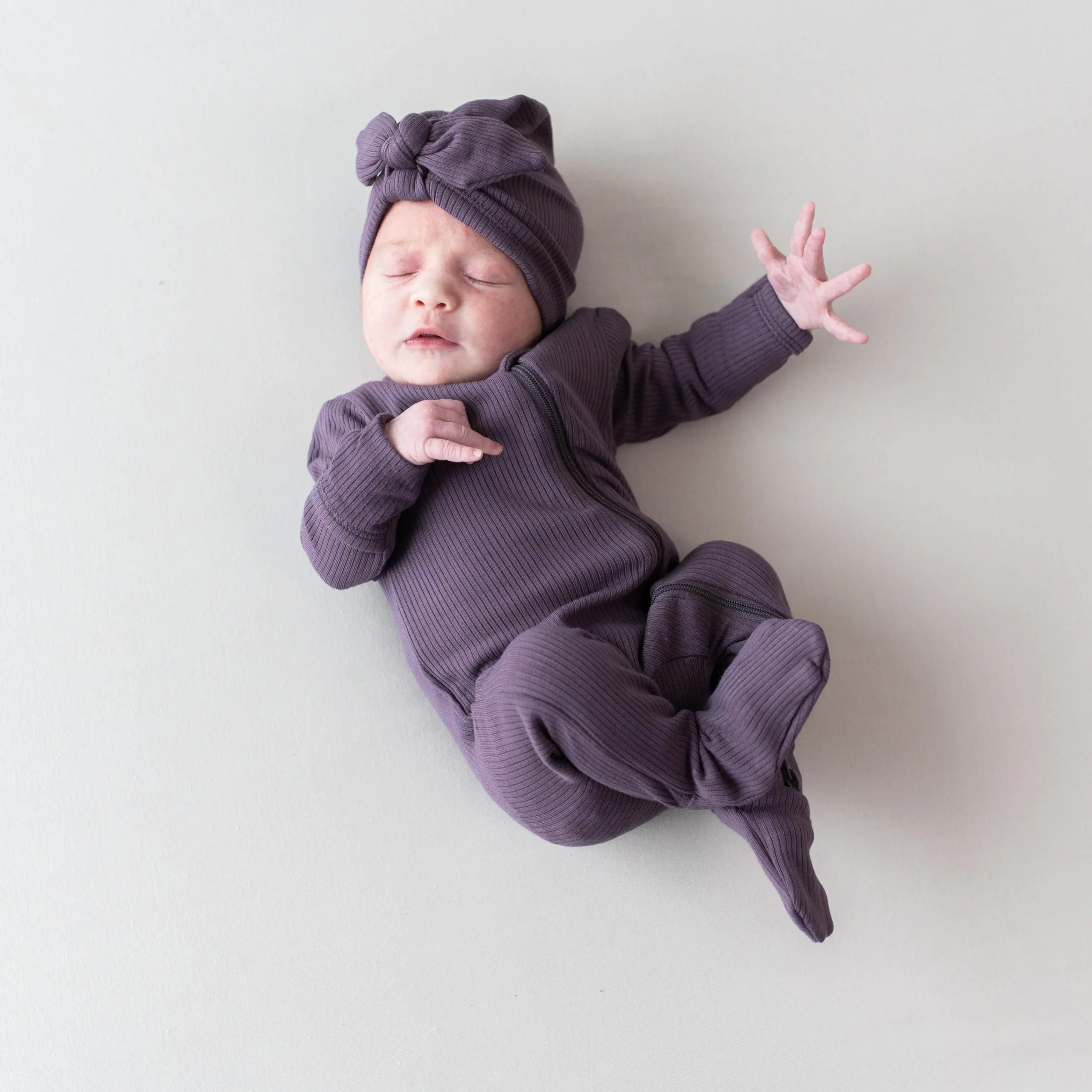 Kyte Baby Ribbed Zipper Footie in Currant