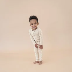 Kyte Baby Ribbed Zipper Romper in Bisque New