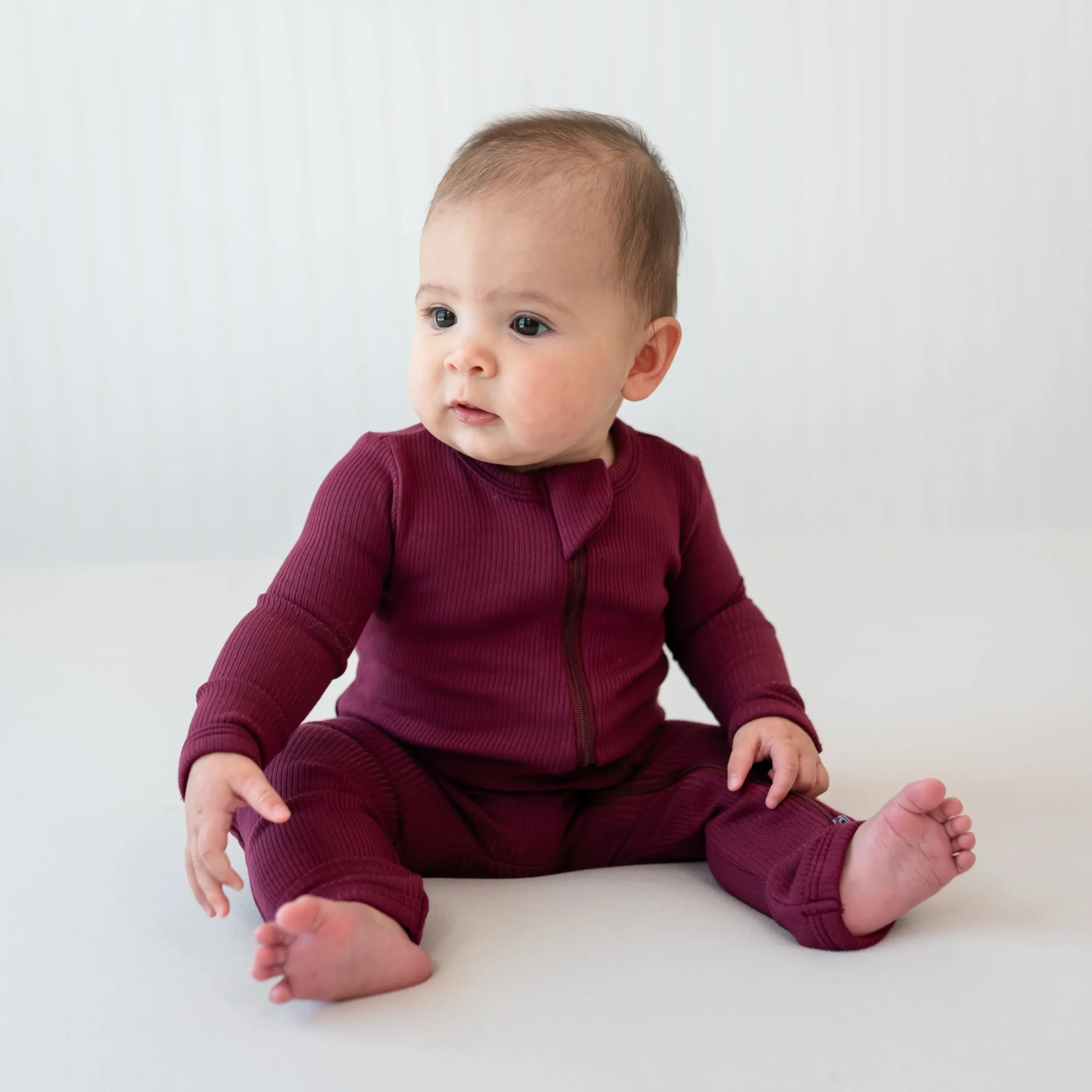Kyte Baby Ribbed Zipper Romper in Burgundy Sale
