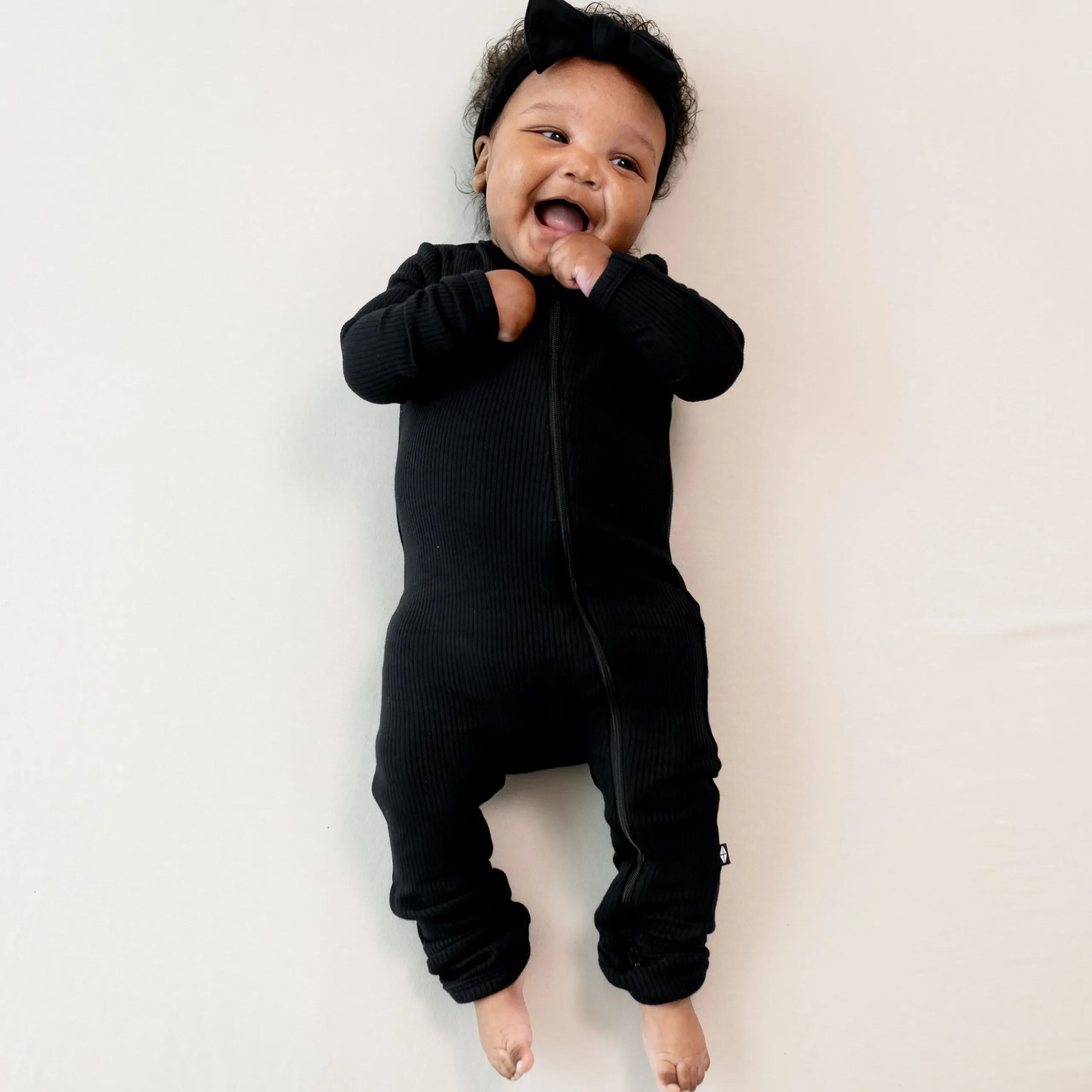 Kyte Baby Ribbed Zipper Romper in Midnight Online