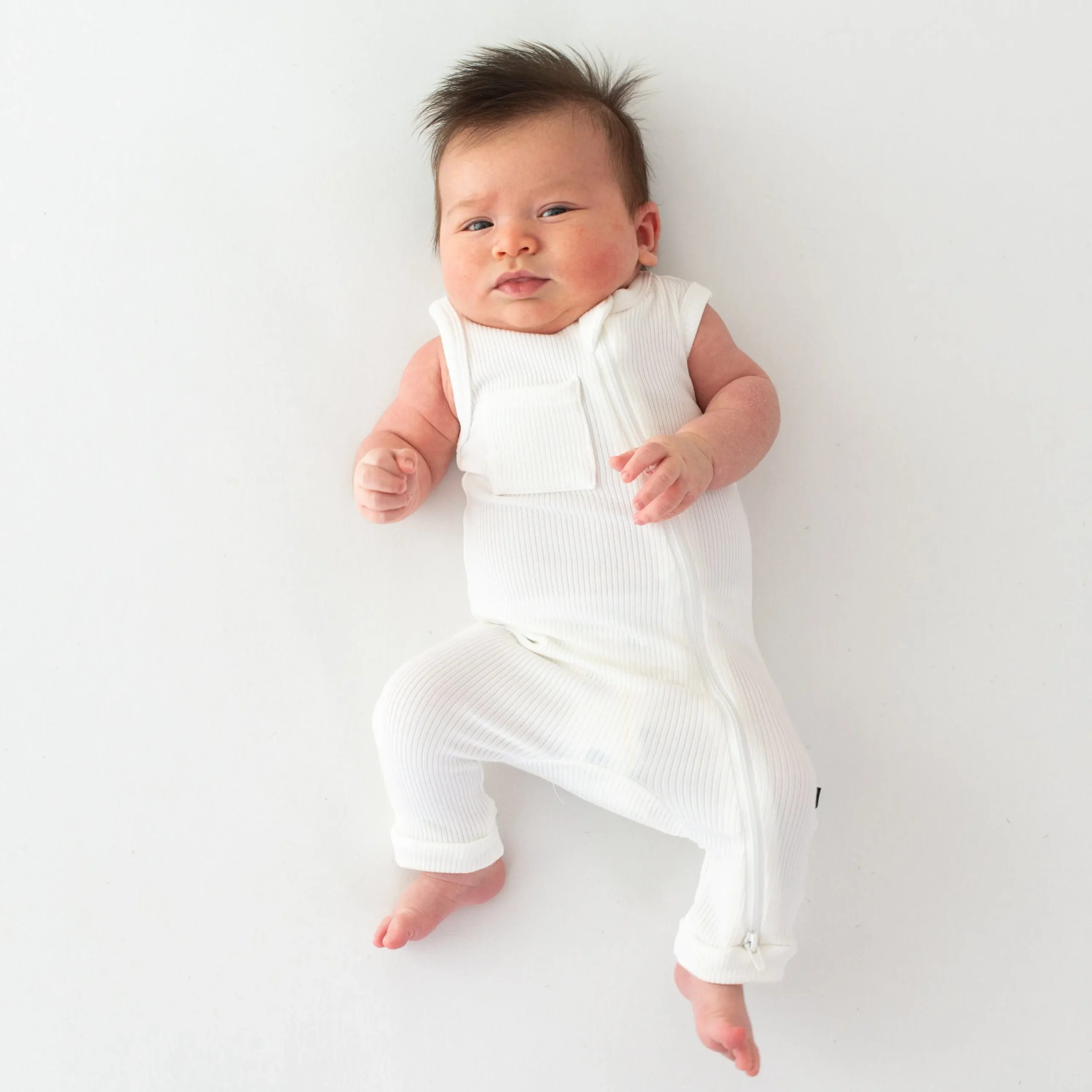 Kyte Baby Ribbed Zippered Sleeveless Romper in Cloud Best