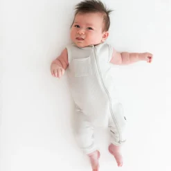 Kyte Baby Ribbed Zippered Sleeveless Romper in Oat