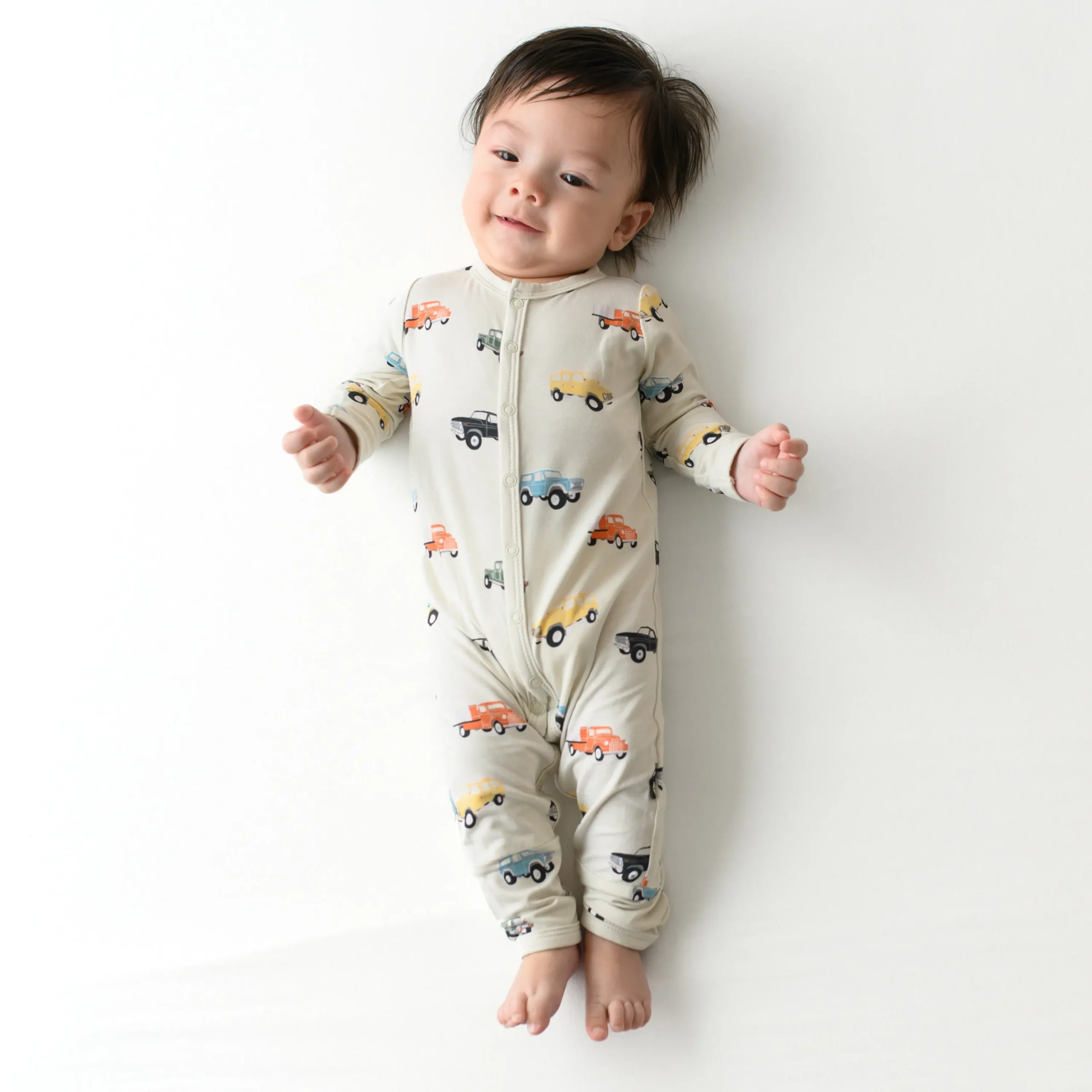 Kyte Baby Romper in Vintage Truck New