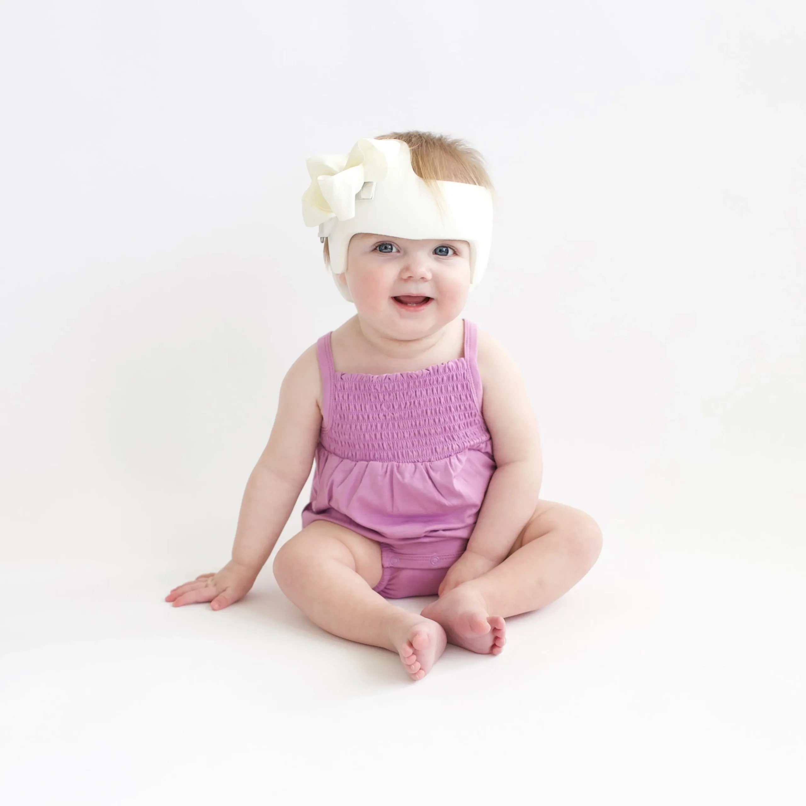 Kyte Baby Smocked Bubble Romper in Poi Discount