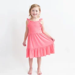 Kyte Baby Smocked Dress in Guava New