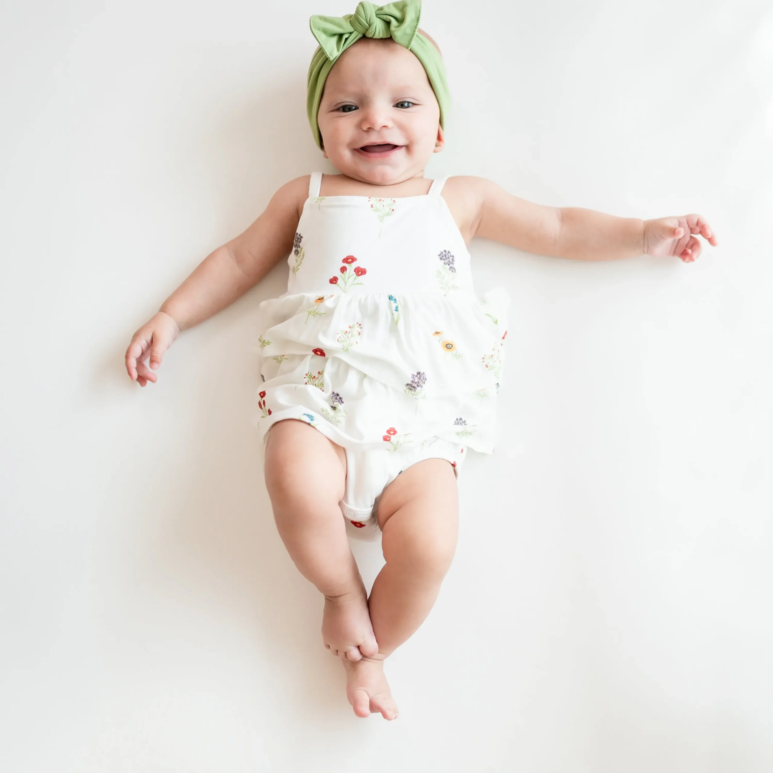 Kyte Baby Spaghetti Strap Ruffle Romper in Wildflower Sale