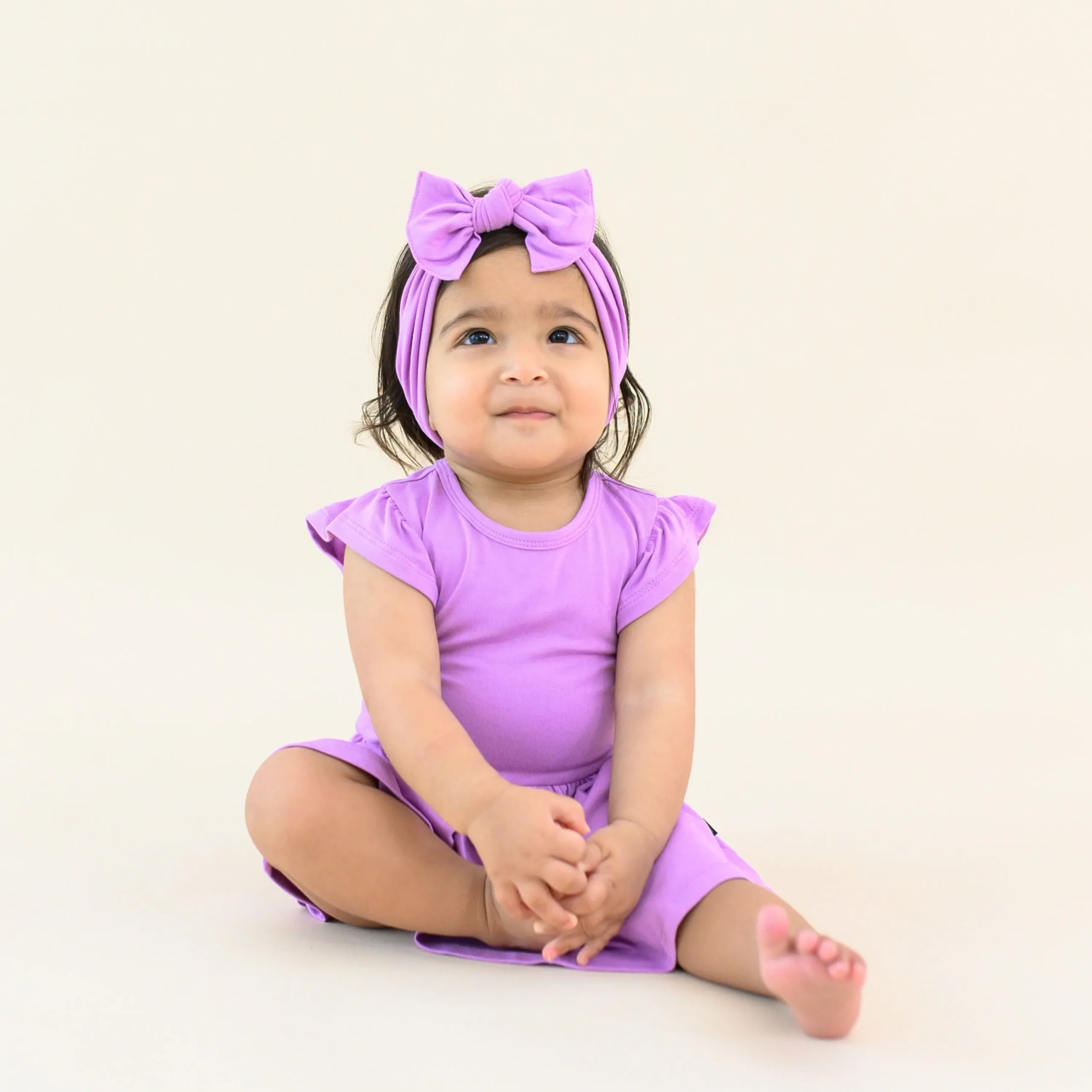 Kyte Baby Twirl Bodysuit Dress in Poi Hot