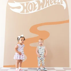 Kyte Baby Twirl Bodysuit Dress in Sparkles and Speed Best