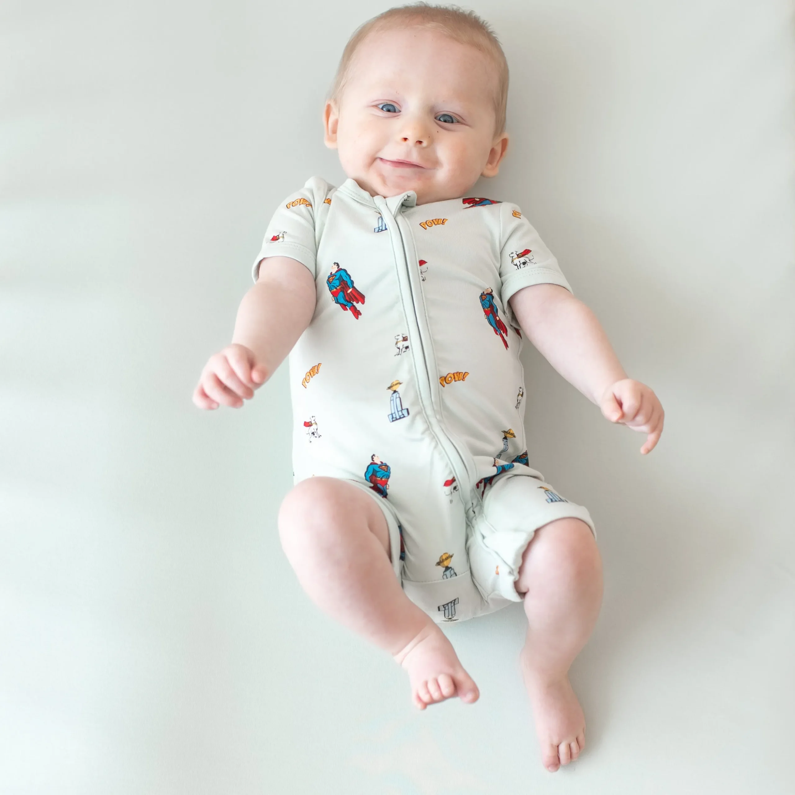 Kyte Baby Zipper Shortall Romper in Superman™ Sale