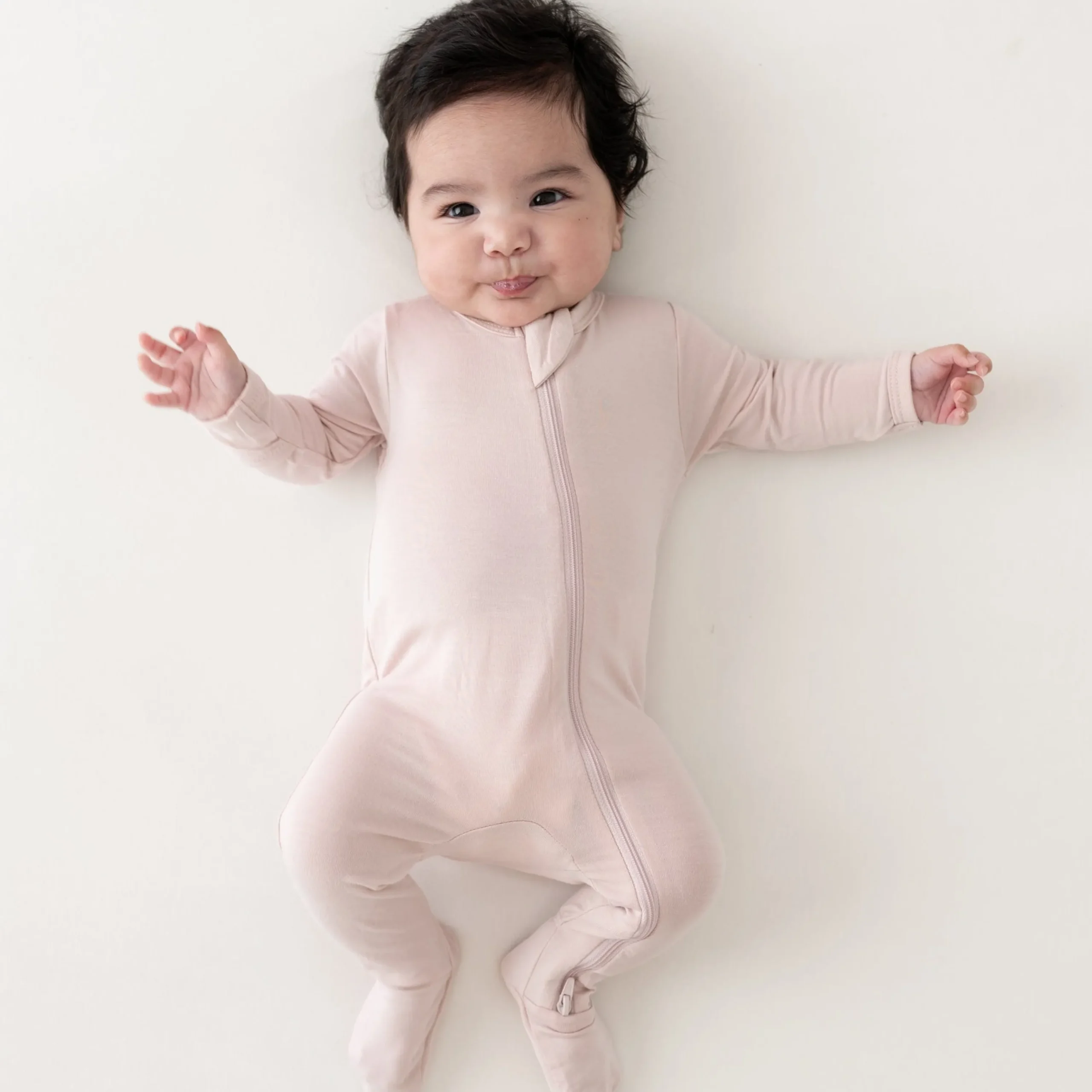 Kyte Baby Zippered Footie in Blush Best