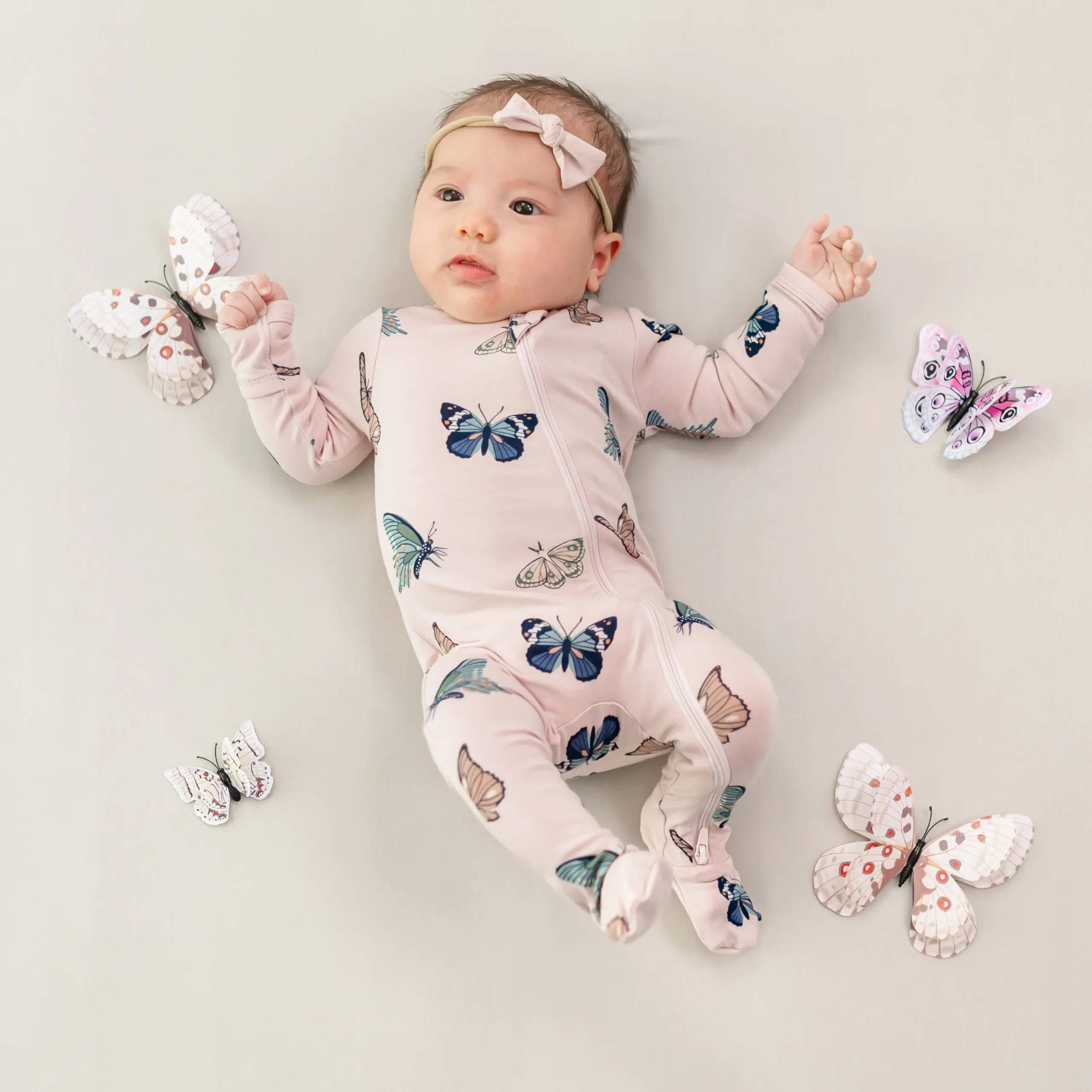 Kyte Baby Zippered Footie in Blush Butterfly Best