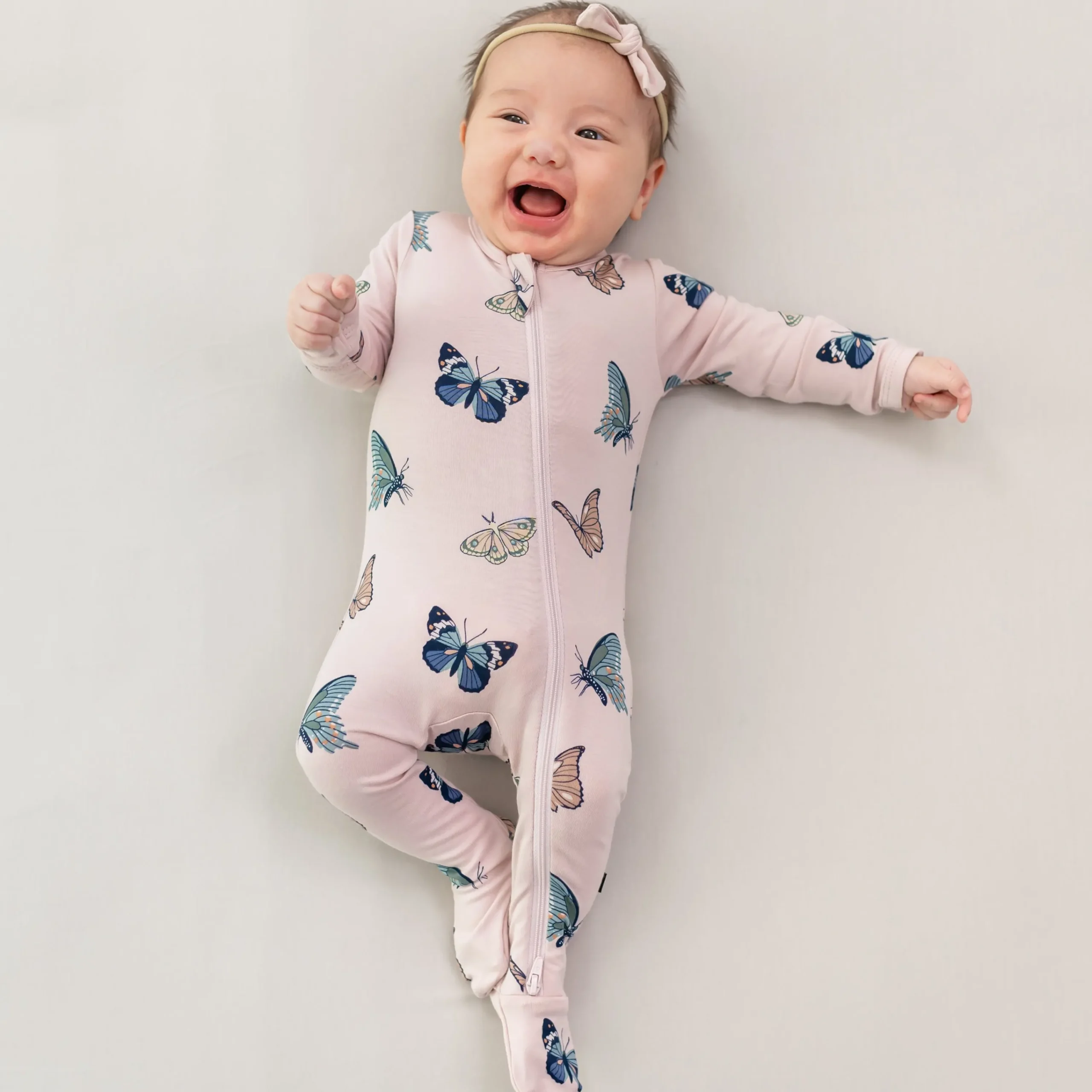 Kyte Baby Zippered Footie in Blush Butterfly Best