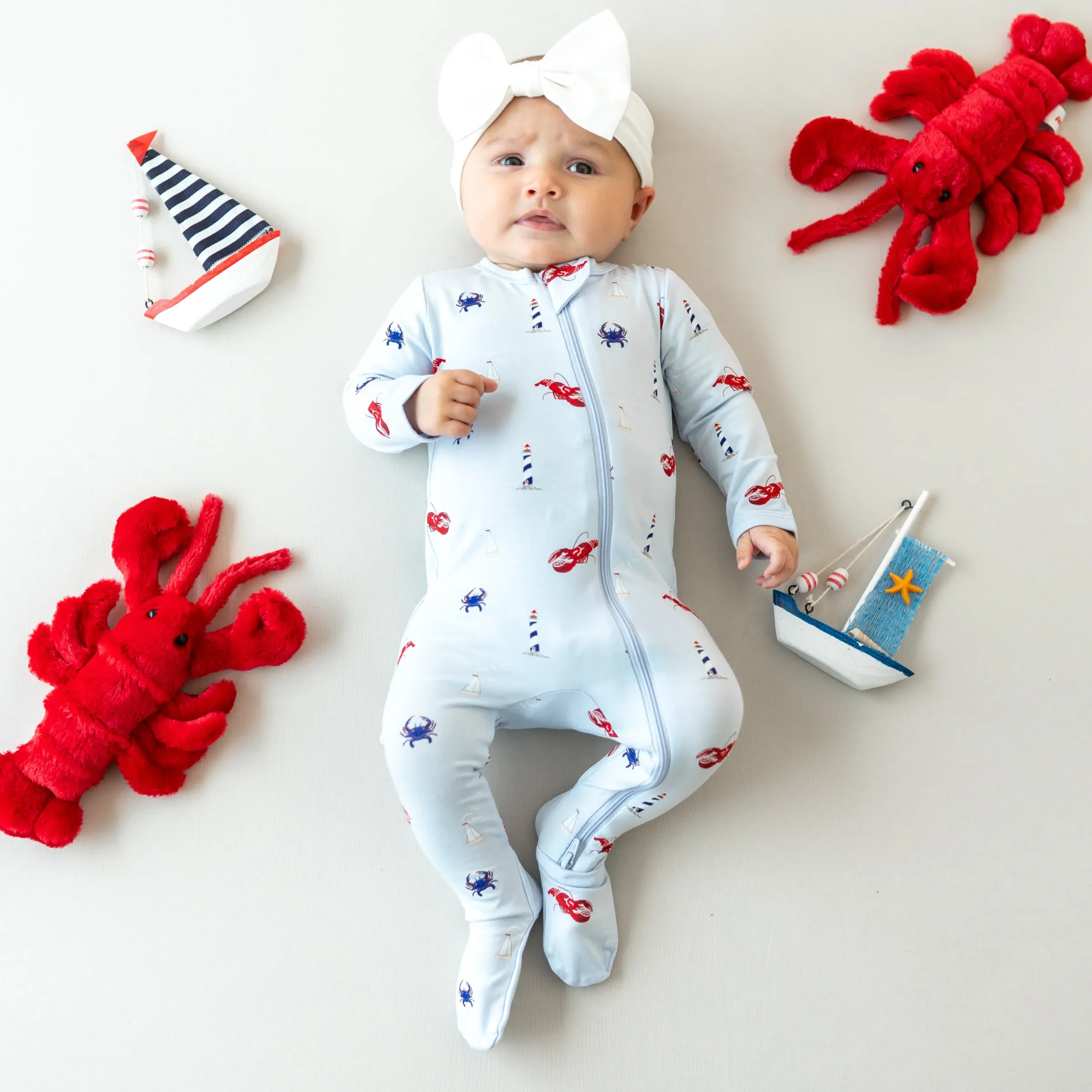 Kyte Baby Zippered Footie in Harbor Hot