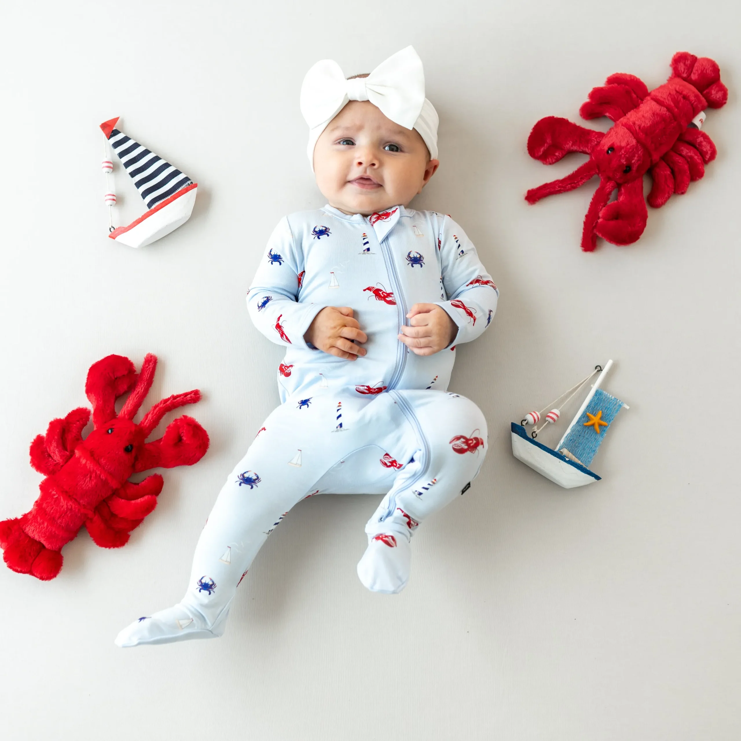 Kyte Baby Zippered Footie in Harbor Hot
