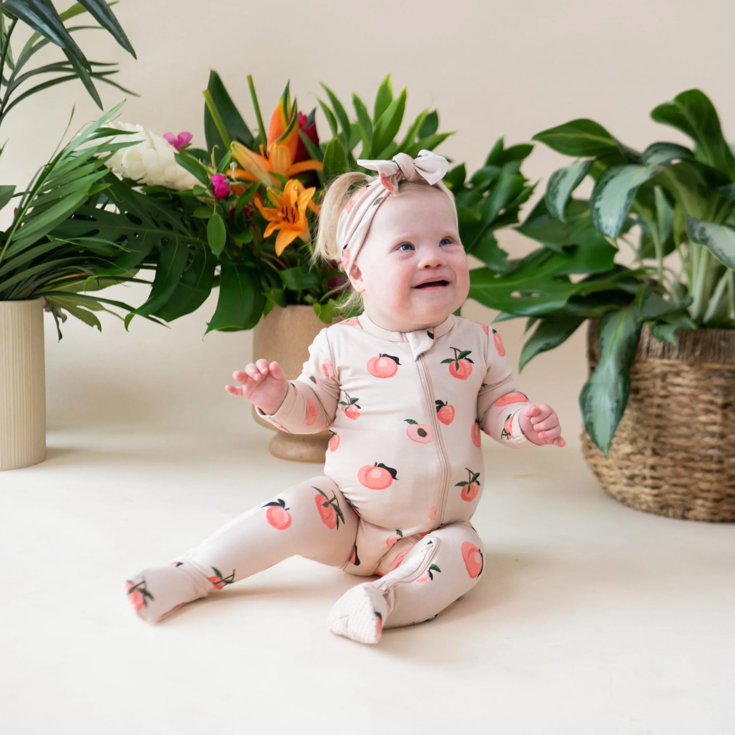 Kyte Baby Zippered Footie in Peach Best