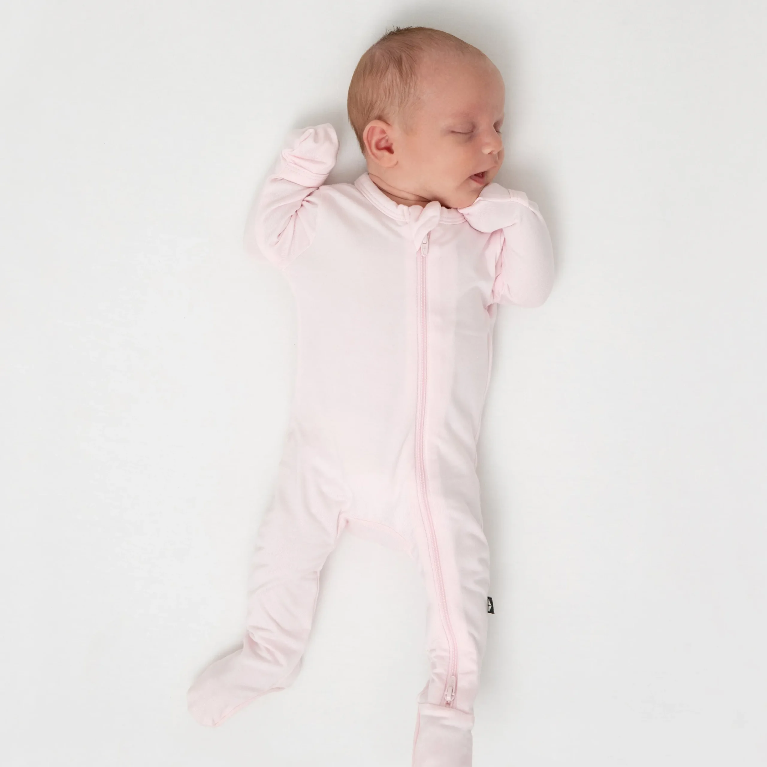 Kyte Baby Zippered Footie in Sakura
