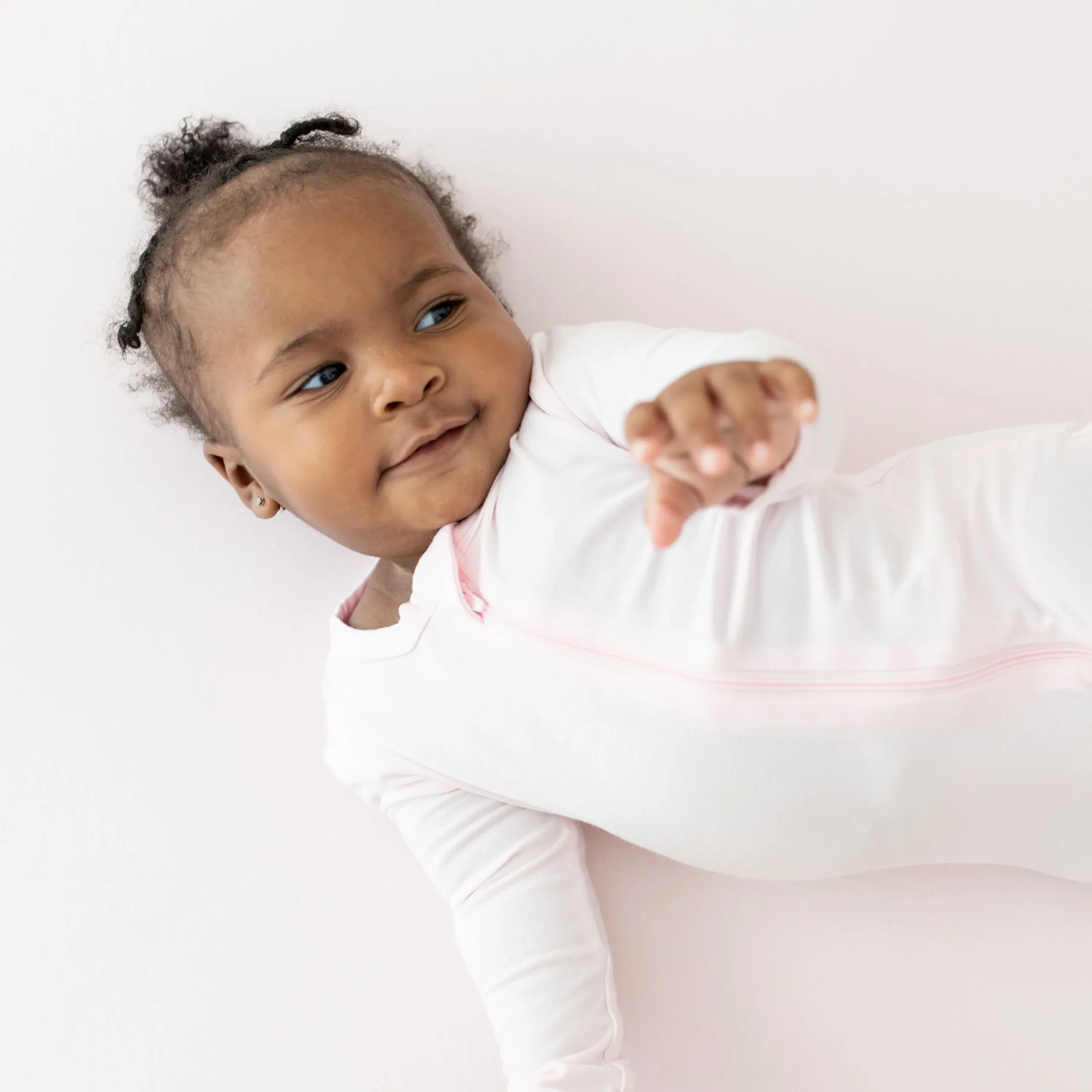 Kyte Baby Zippered Footie in Sakura