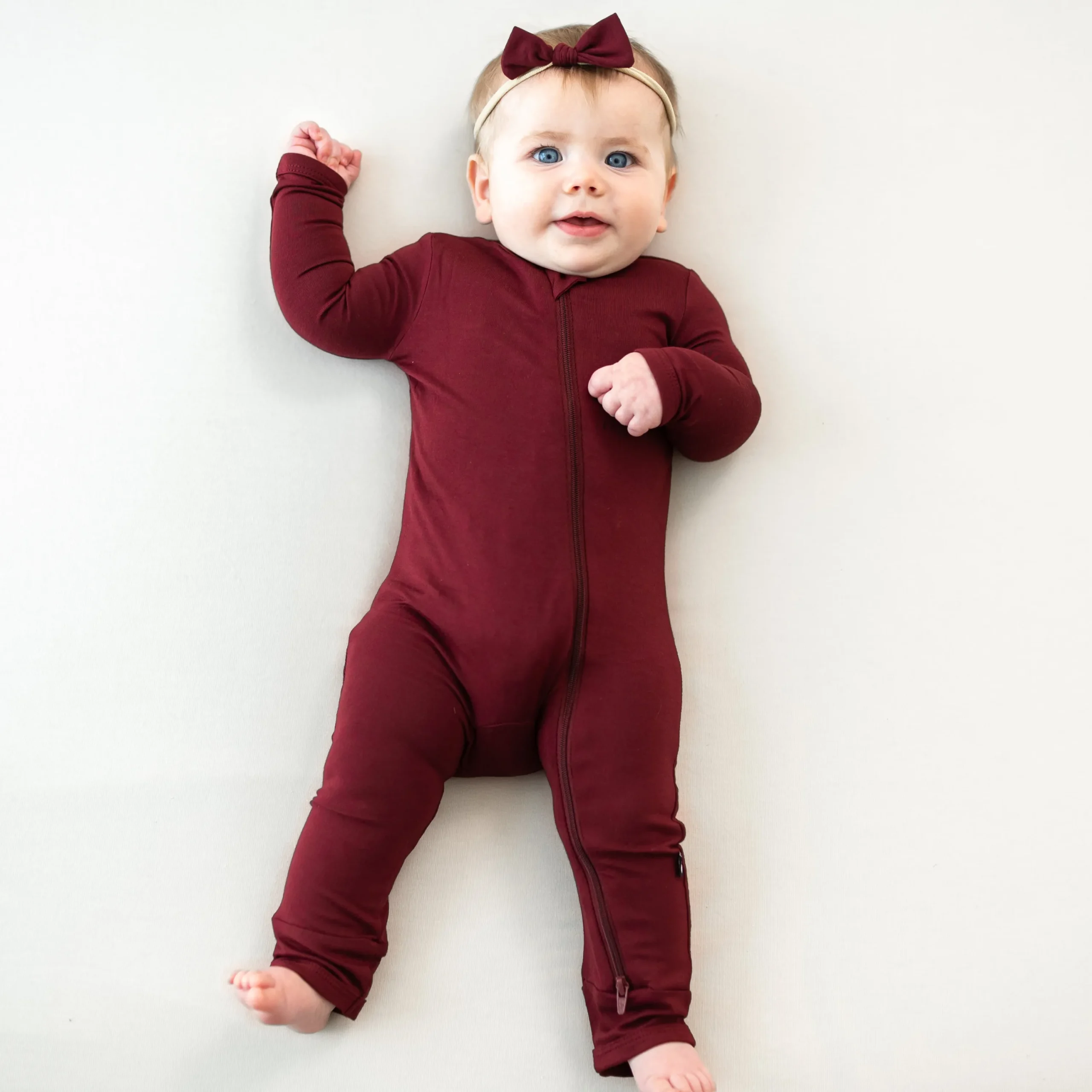 Kyte Baby Zippered Romper in Burgundy Hot