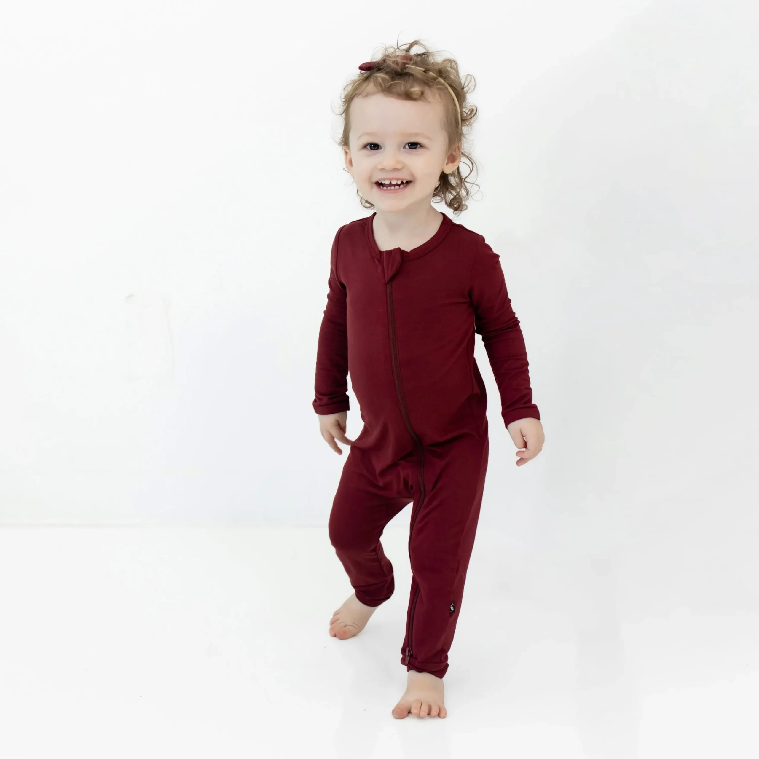 Kyte Baby Zippered Romper in Burgundy Hot