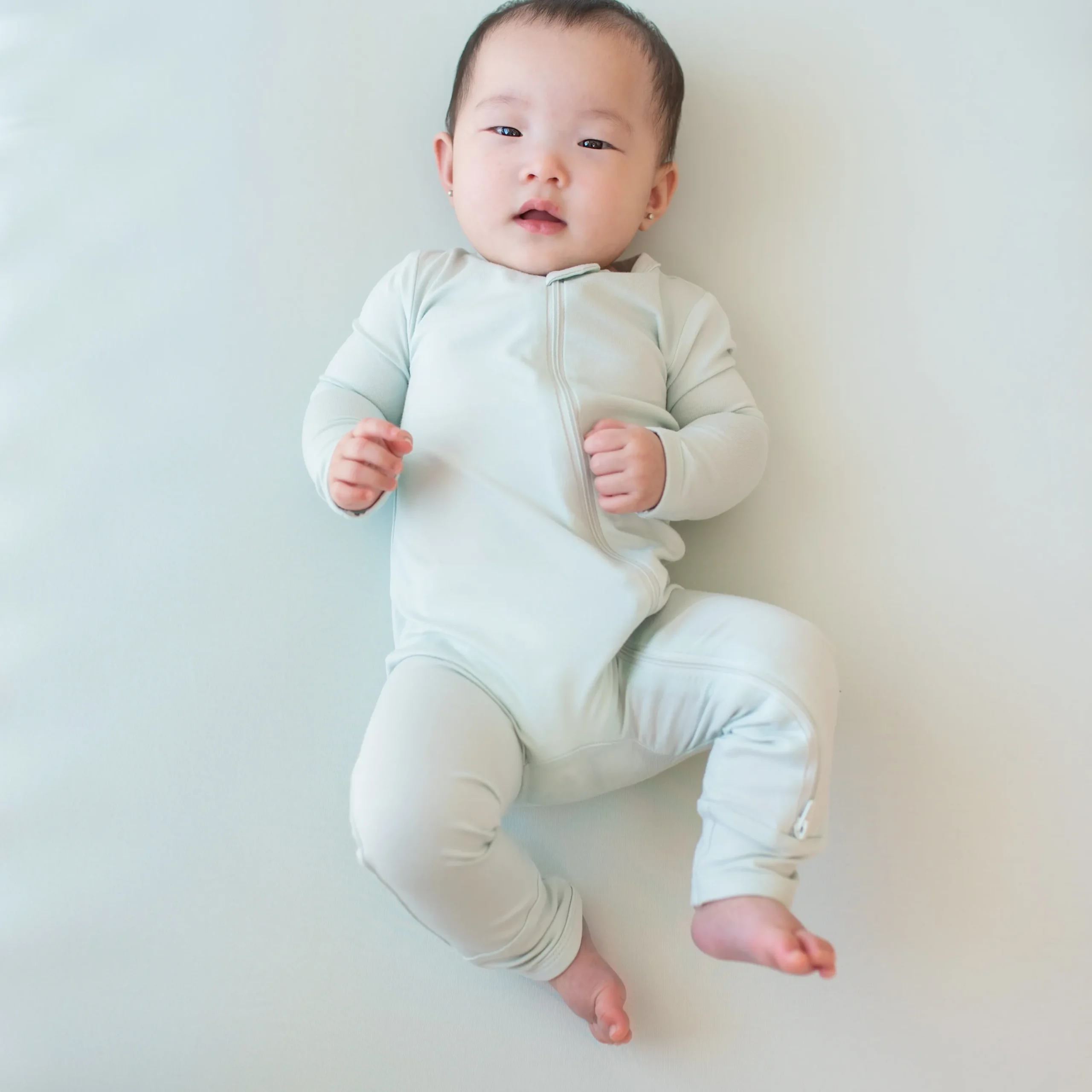 Kyte Baby Zippered Romper in Dew Hot