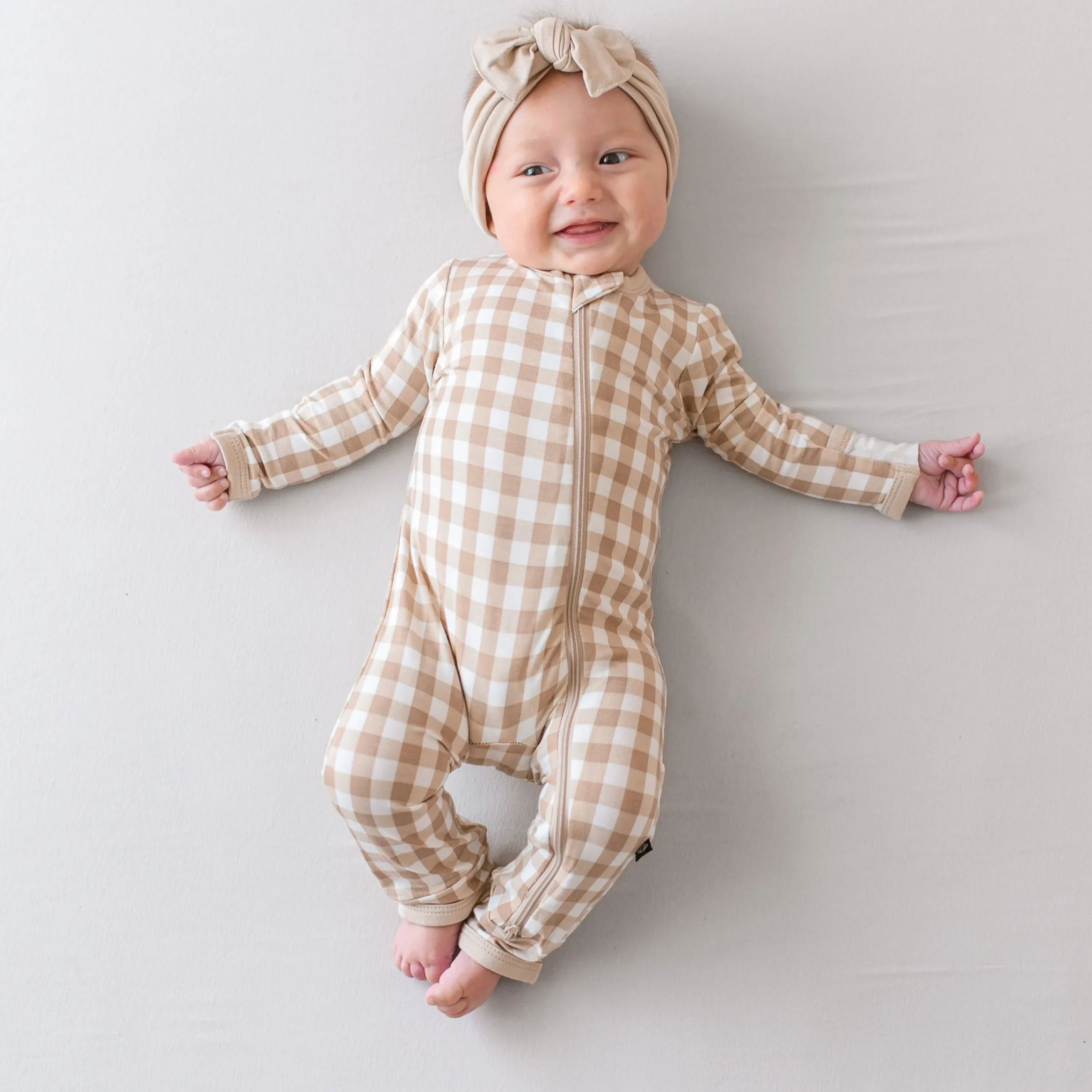Kyte Baby Zippered Romper in Gingham Bisque Hot