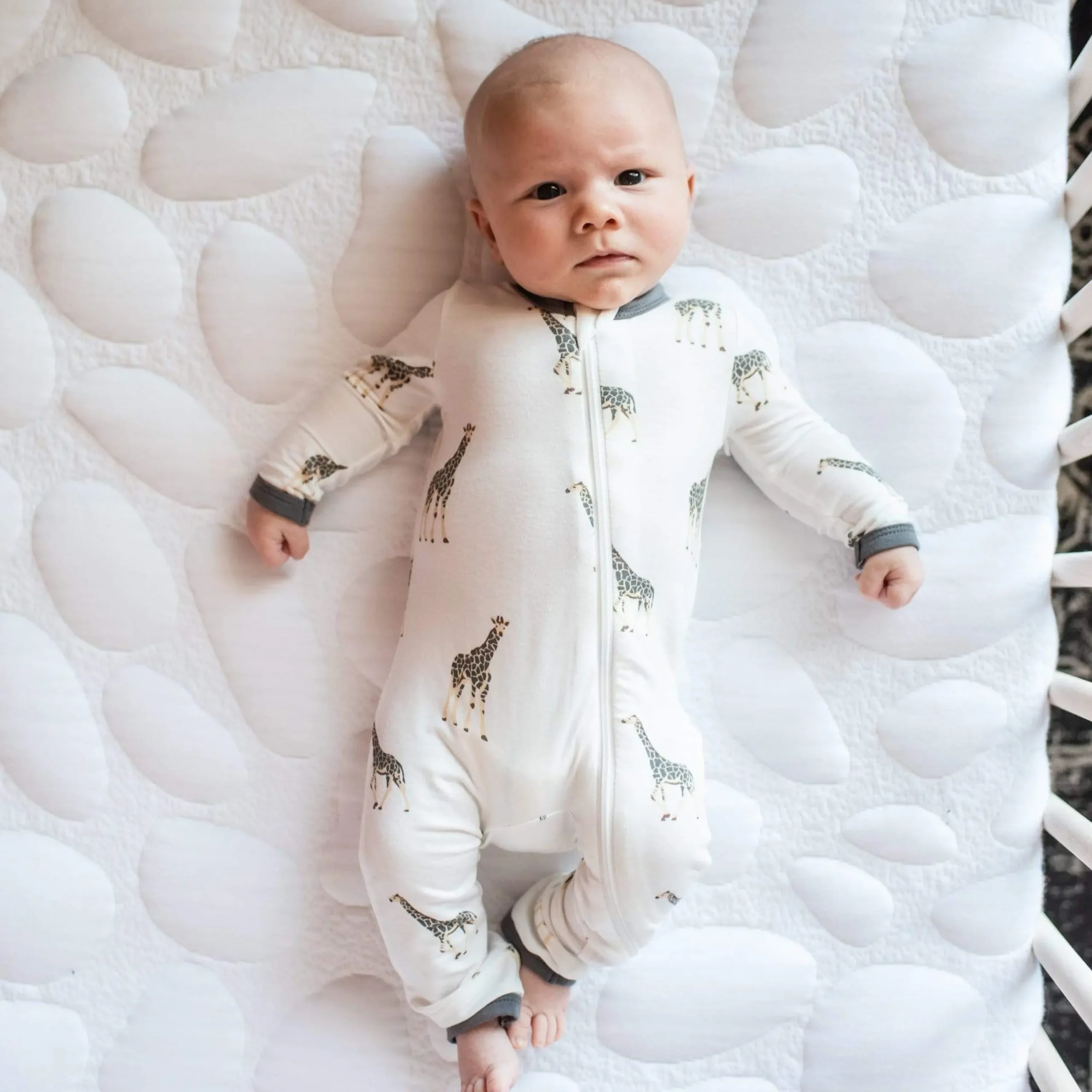 Kyte Baby Zippered Romper in Giraffe New