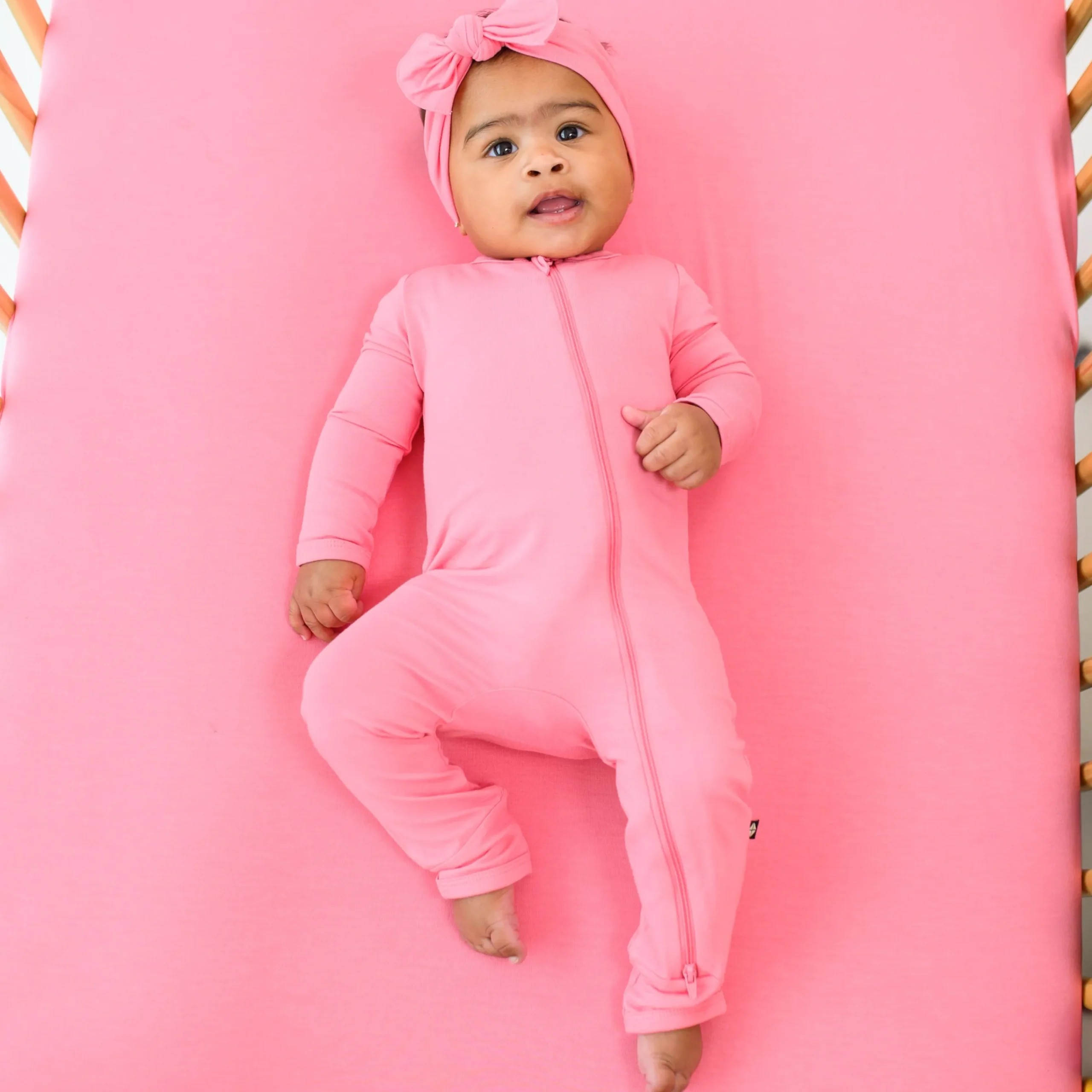 Kyte Baby Zippered Romper in Guava Online
