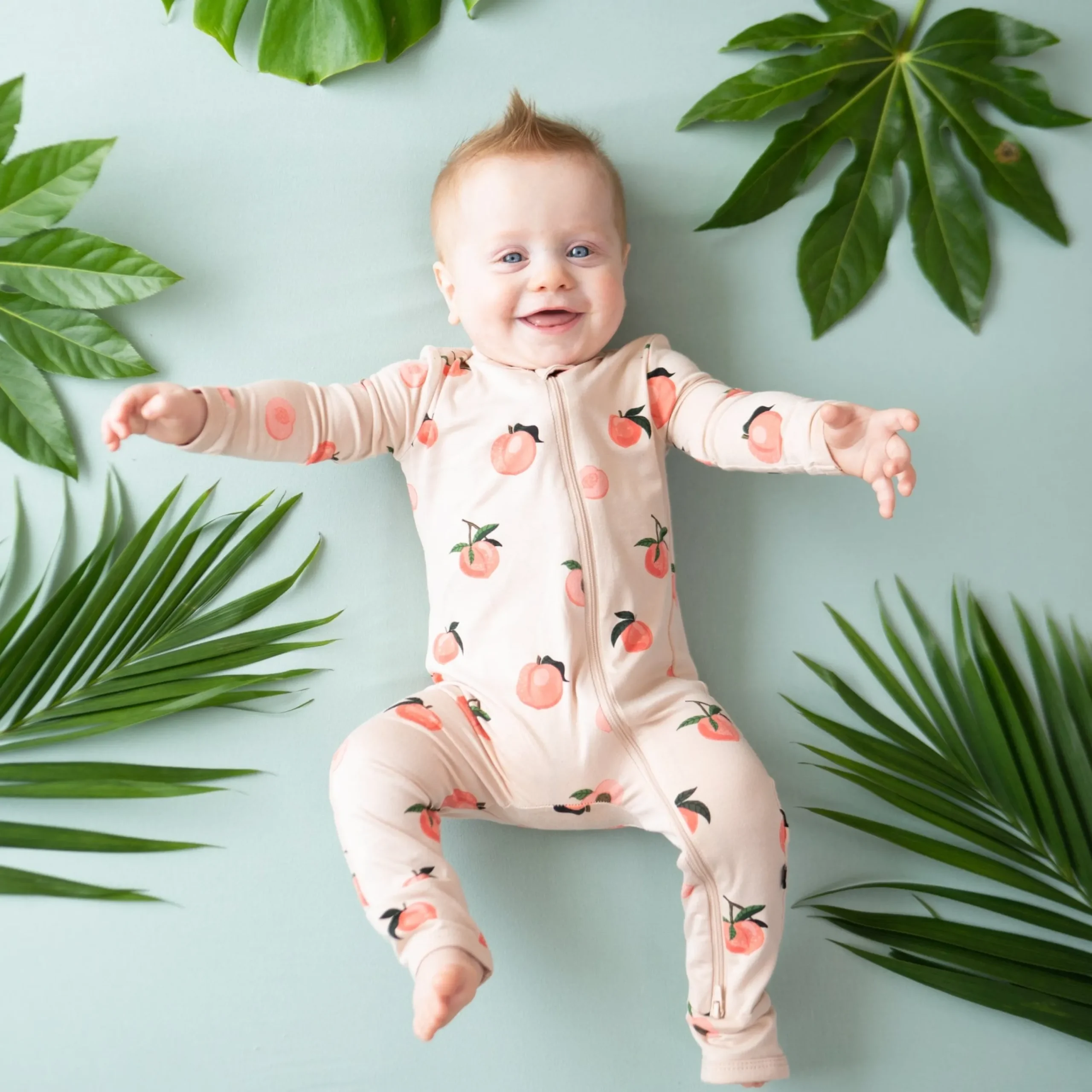 Kyte Baby Zippered Romper in Peach Online