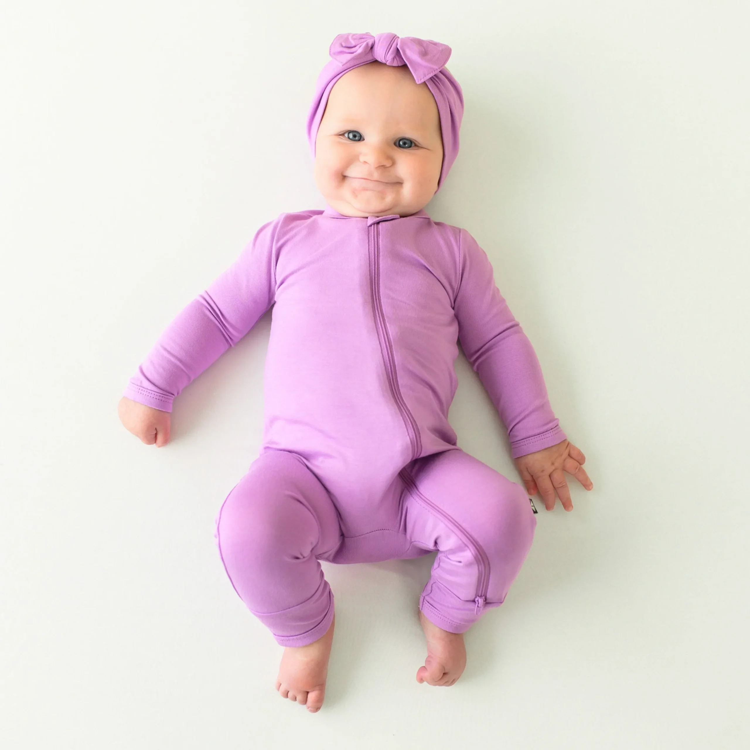 Kyte Baby Zippered Romper in Poi Hot