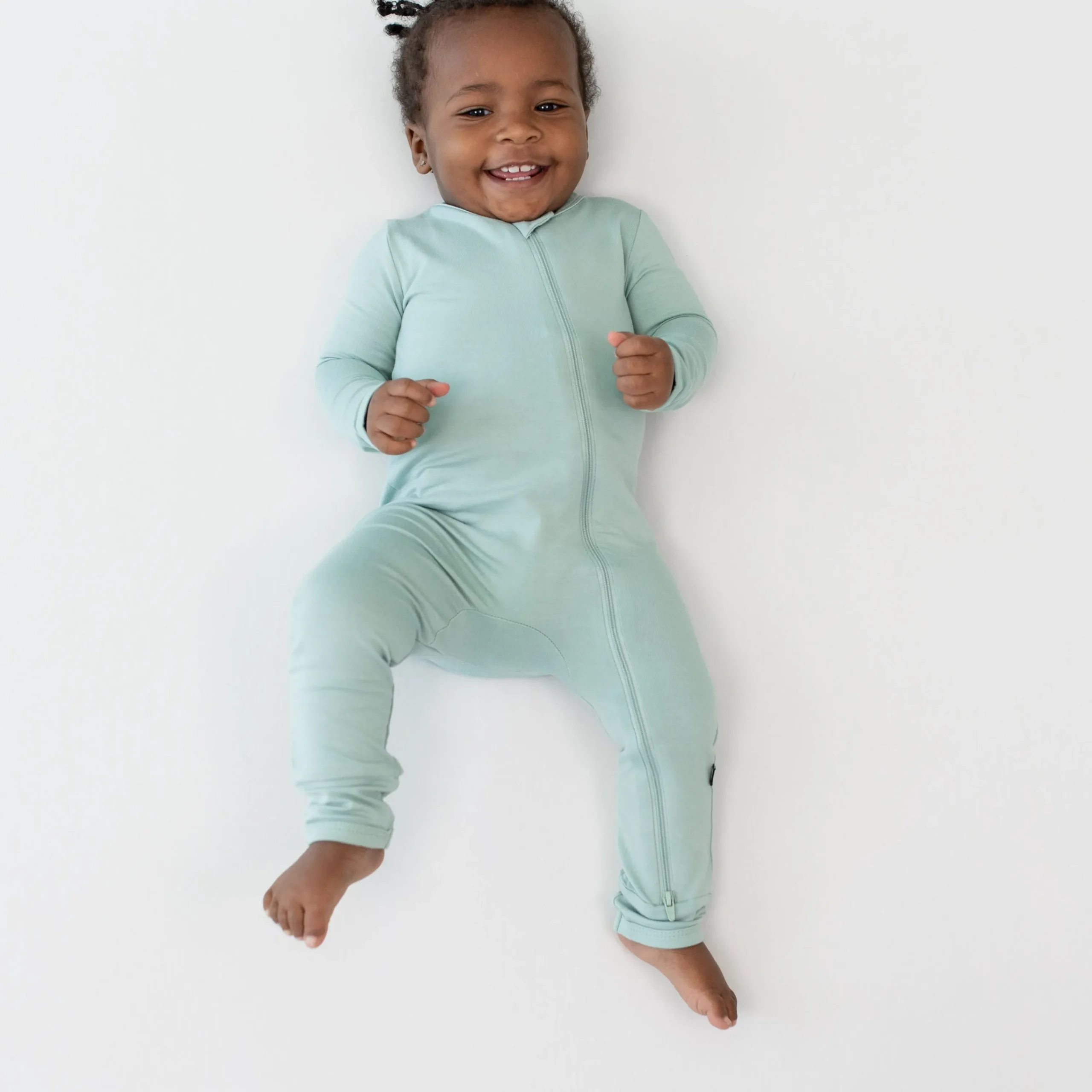 Kyte Baby Zippered Romper in Sage Hot