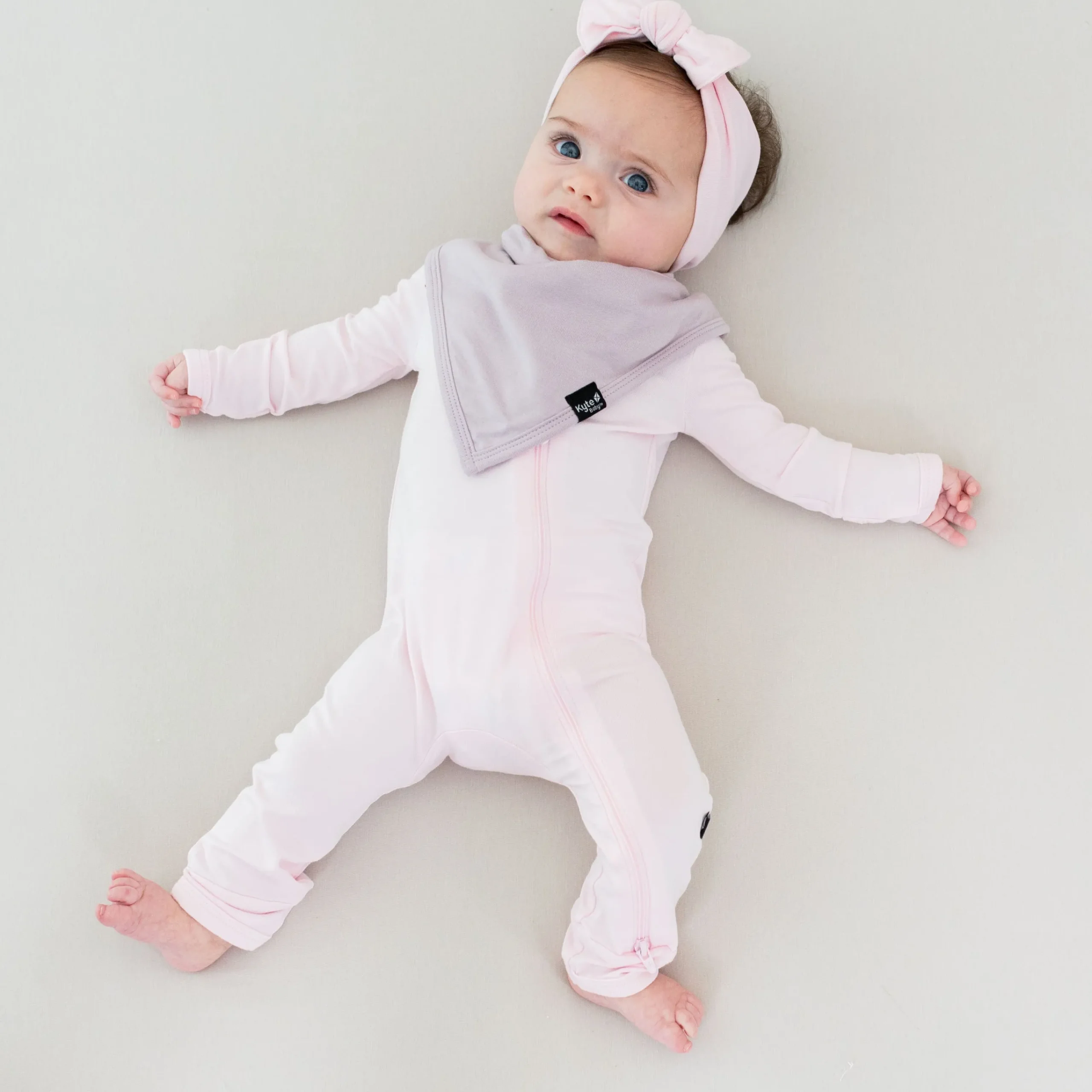 Kyte Baby Zippered Romper in Sakura Clearance