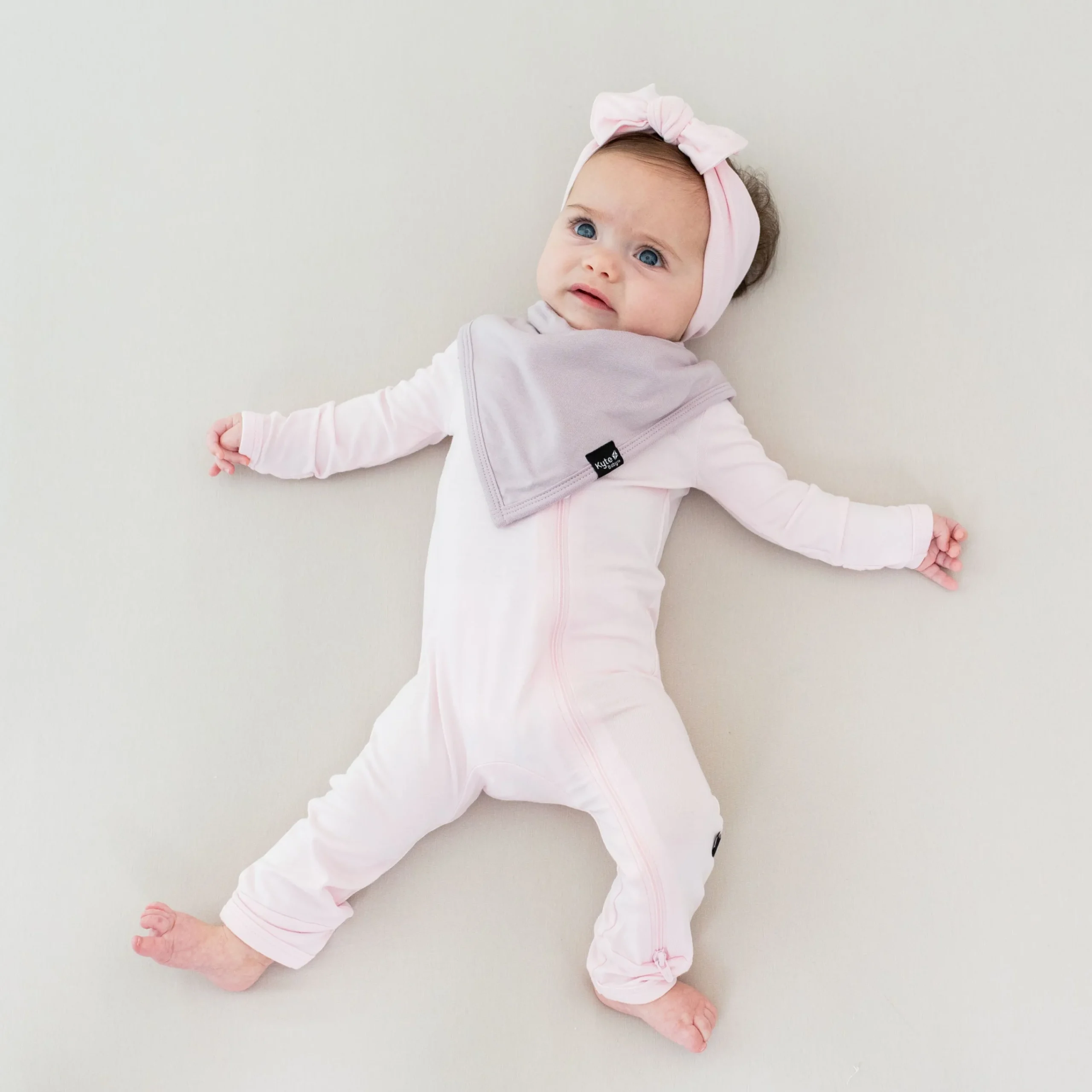Kyte Baby Zippered Romper in Sakura Clearance