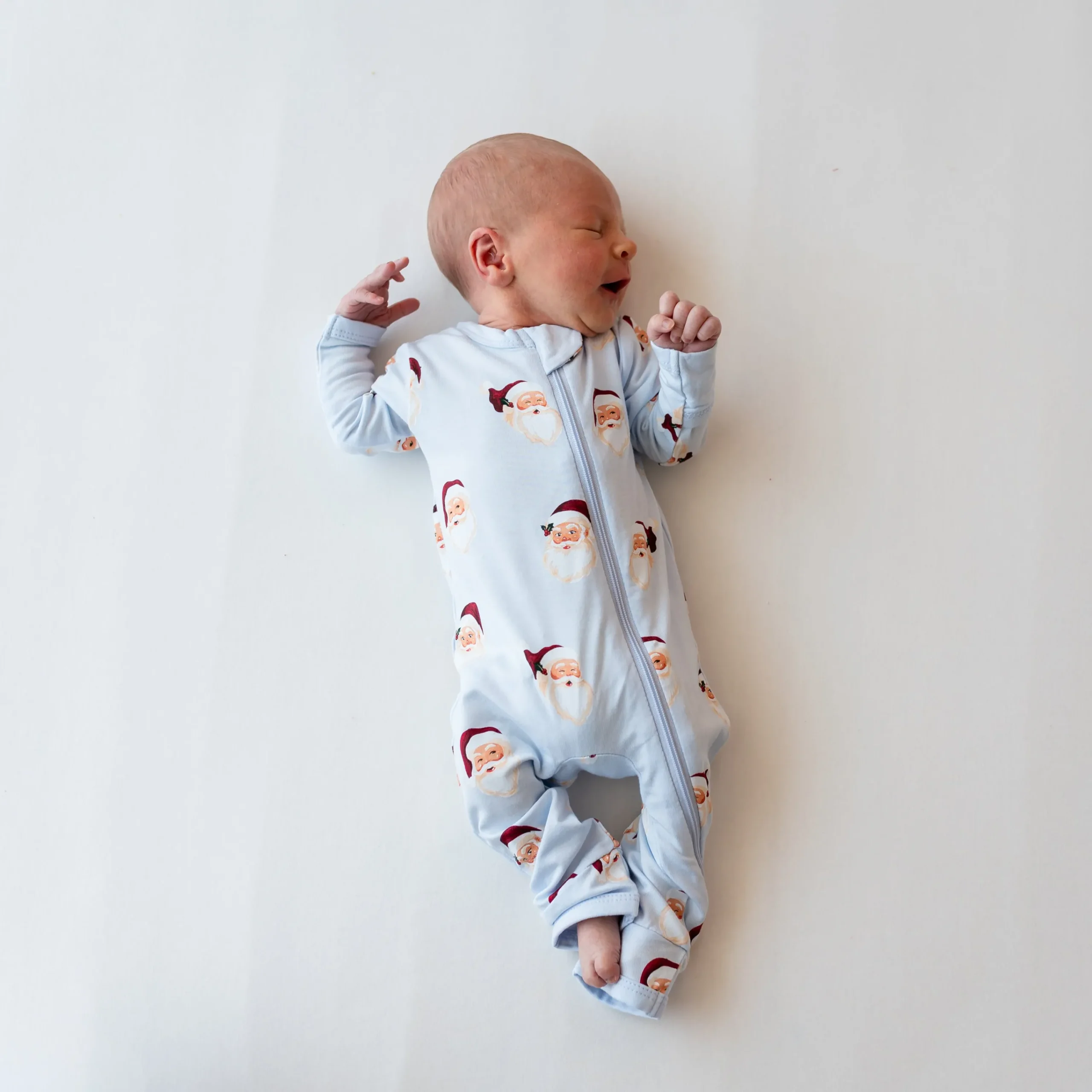 Kyte Baby Zippered Romper in Vintage Santa Discount