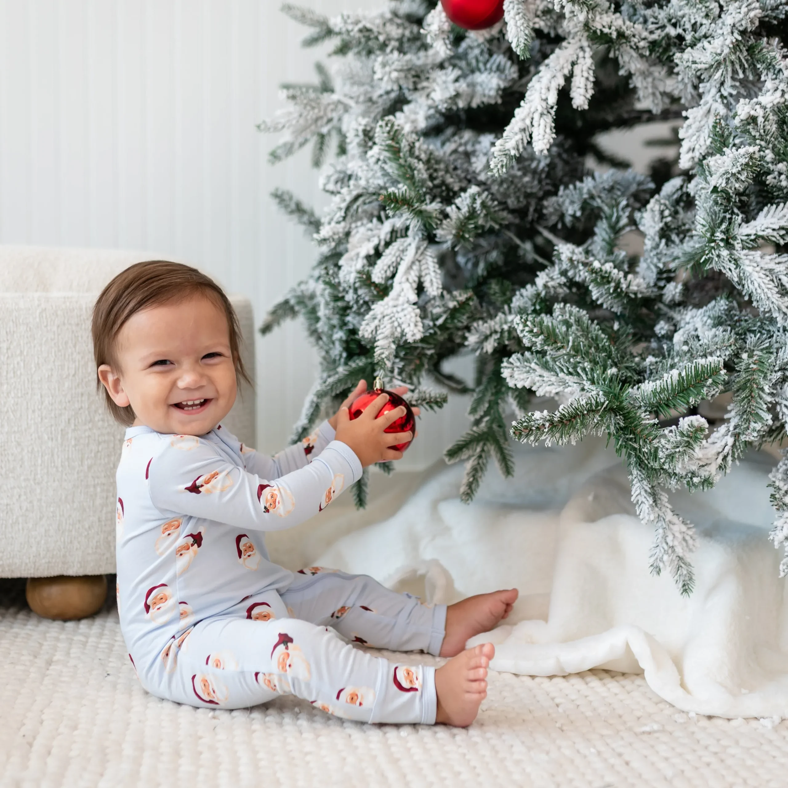 Kyte Baby Zippered Romper in Vintage Santa Discount