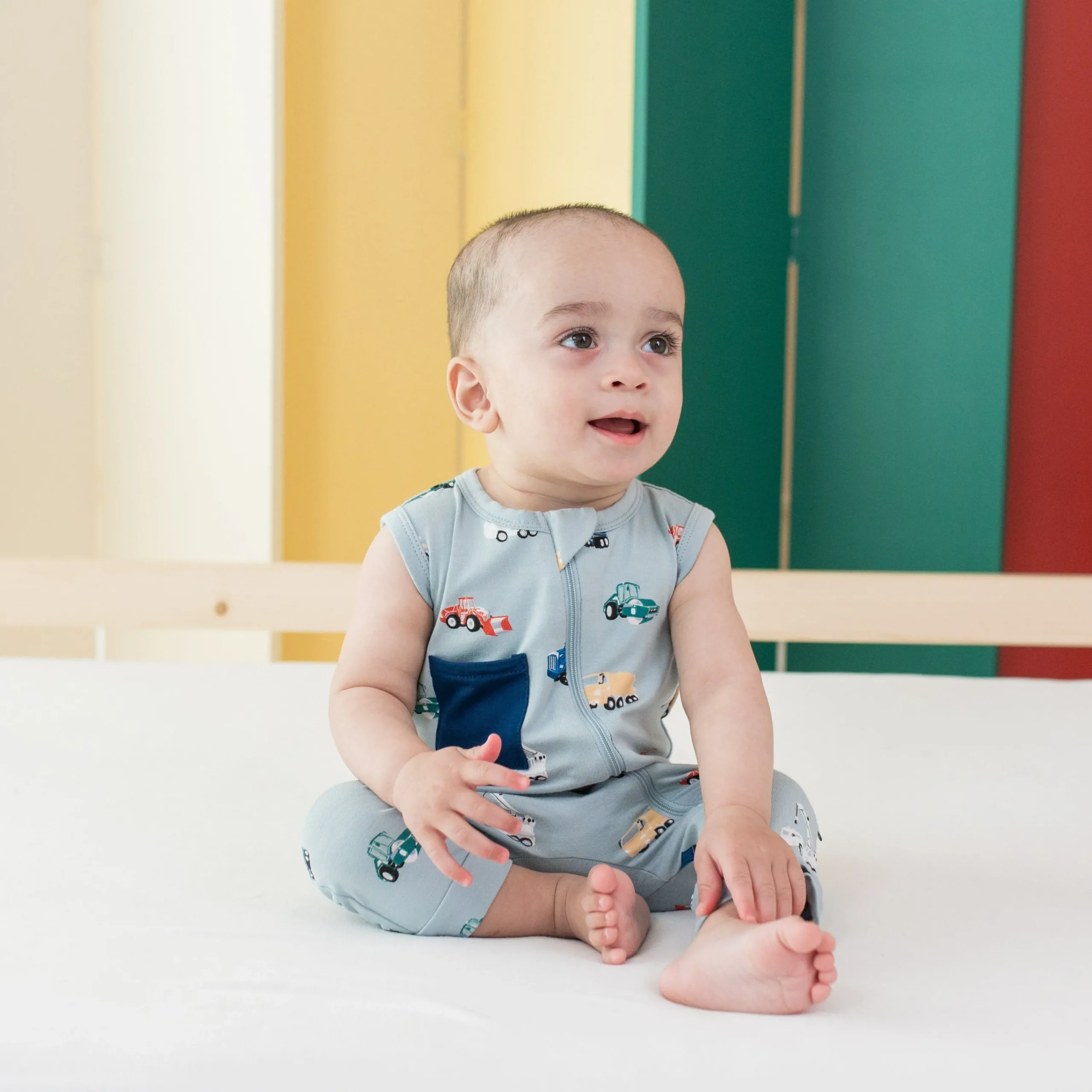 Kyte Baby Zippered Sleeveless Romper in Construction Hot