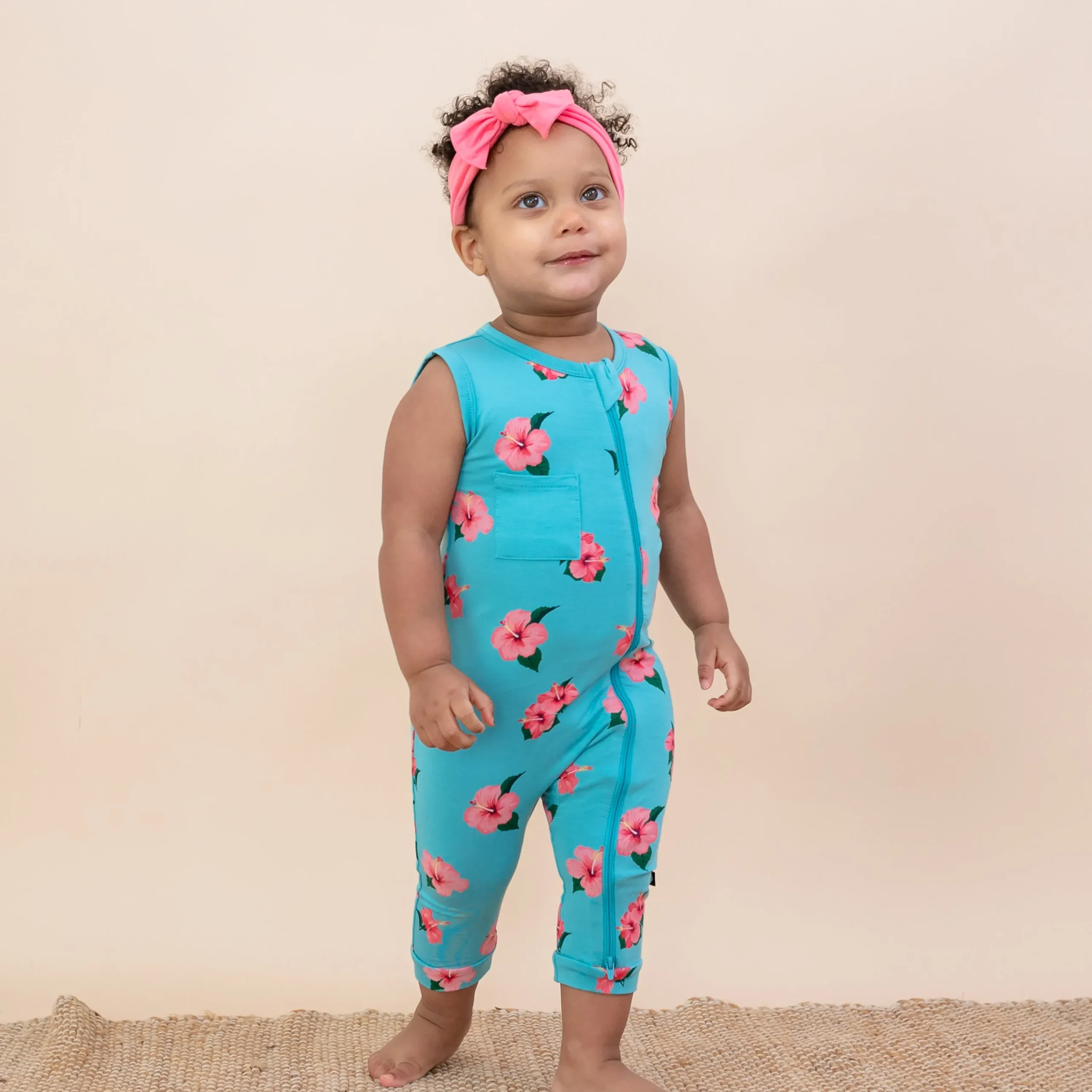 Kyte Baby Zippered Sleeveless Romper in Hibiscus Outlet