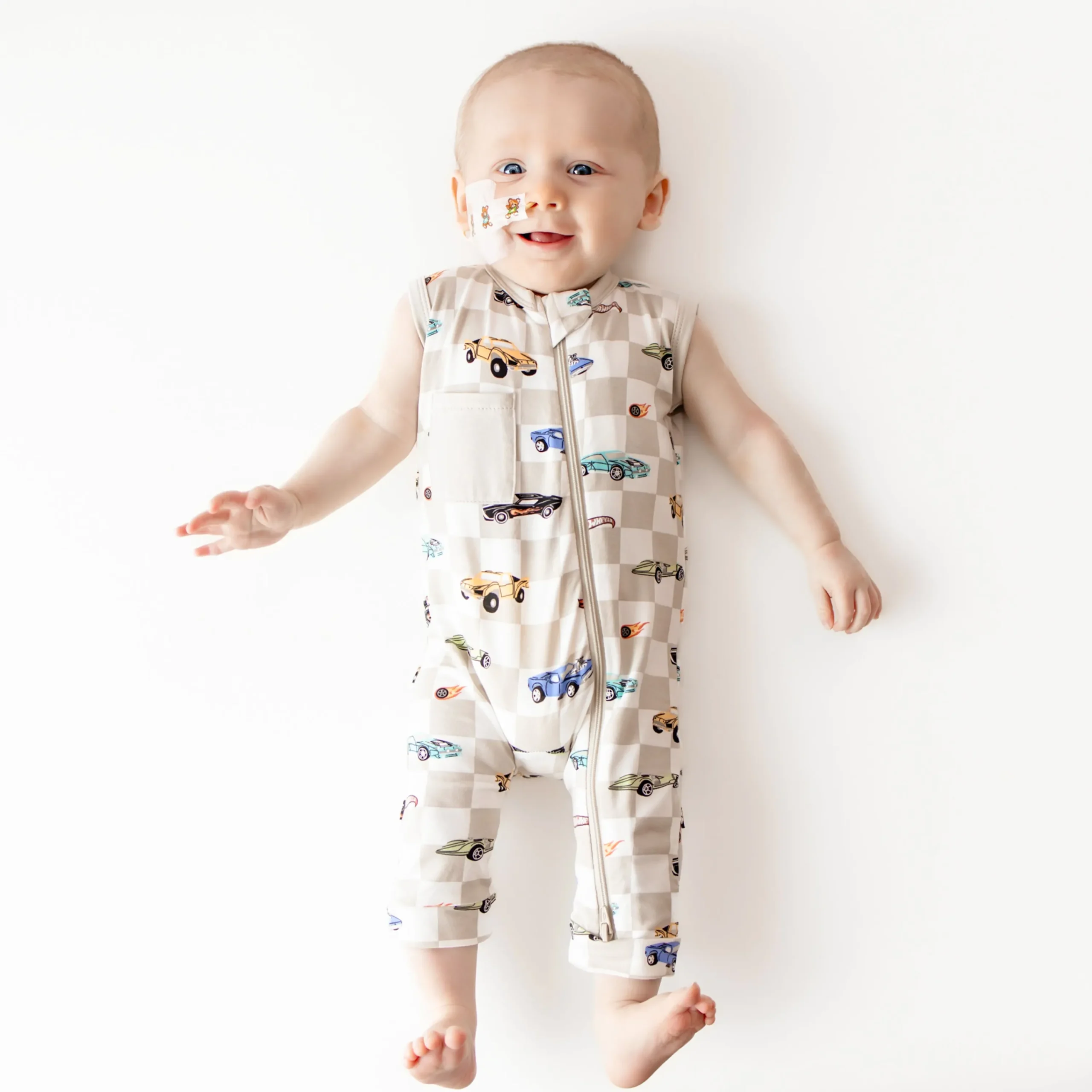 Kyte Baby Zippered Sleeveless Romper in Fast and Fierce New