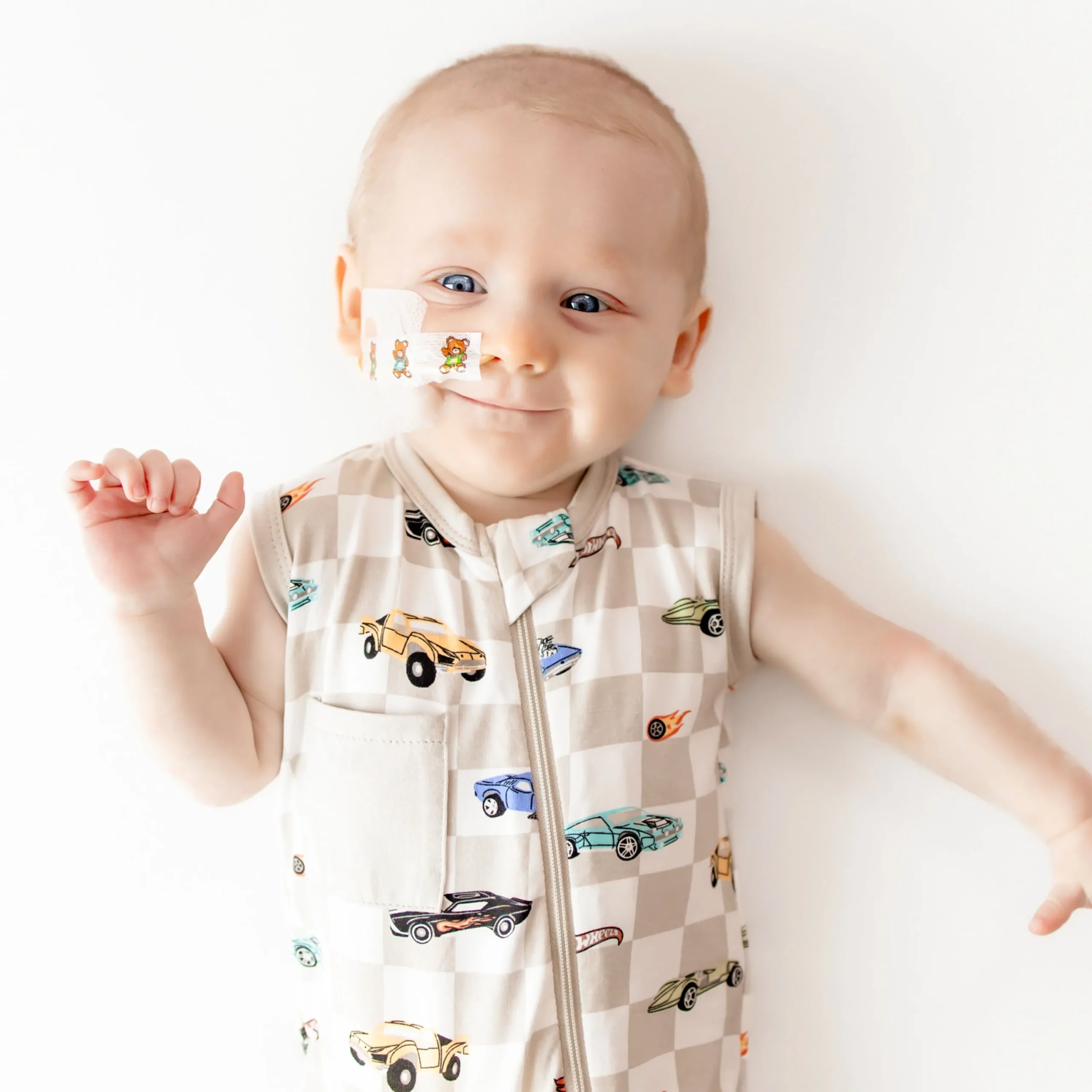 Kyte Baby Zippered Sleeveless Romper in Fast and Fierce New