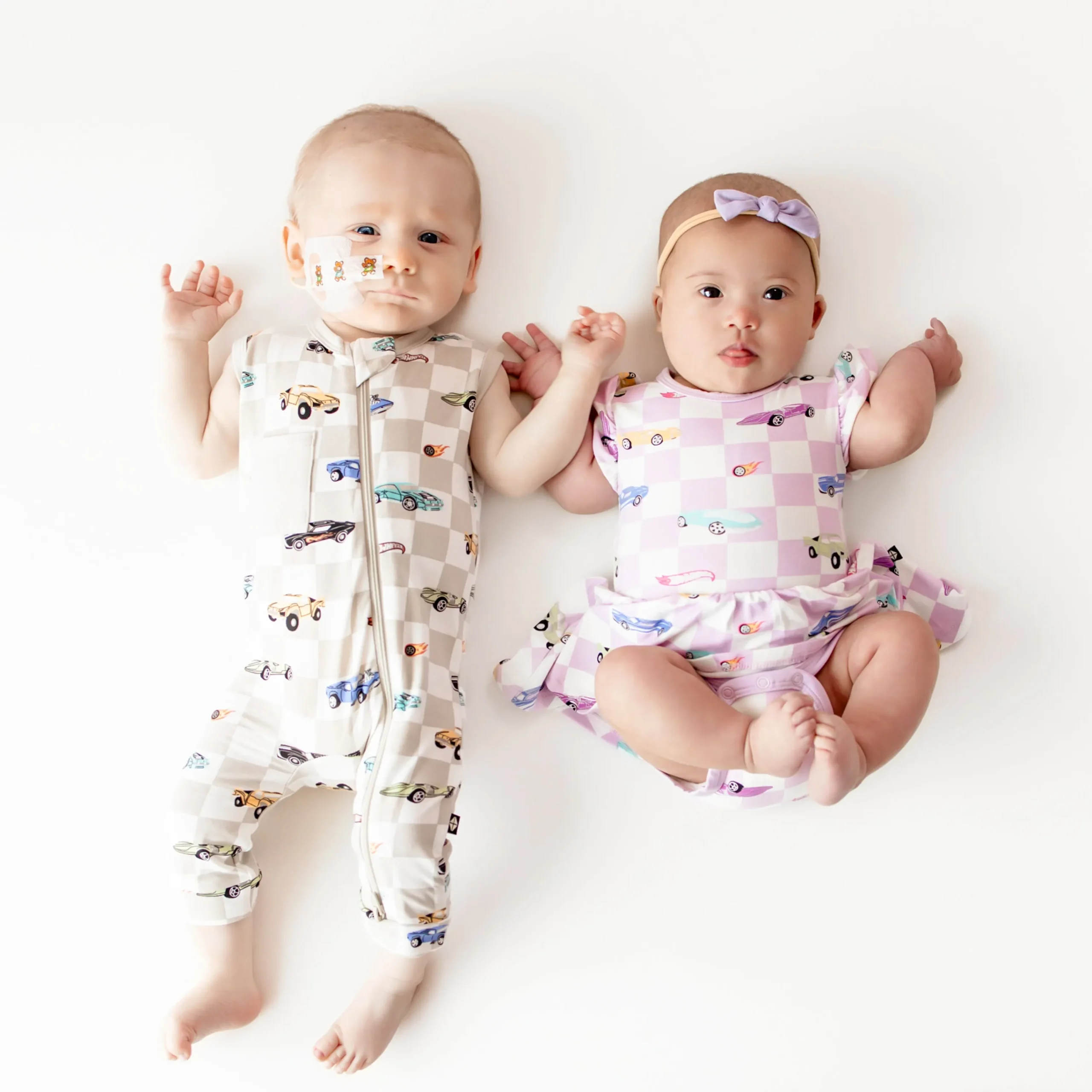 Kyte Baby Zippered Sleeveless Romper in Fast and Fierce New